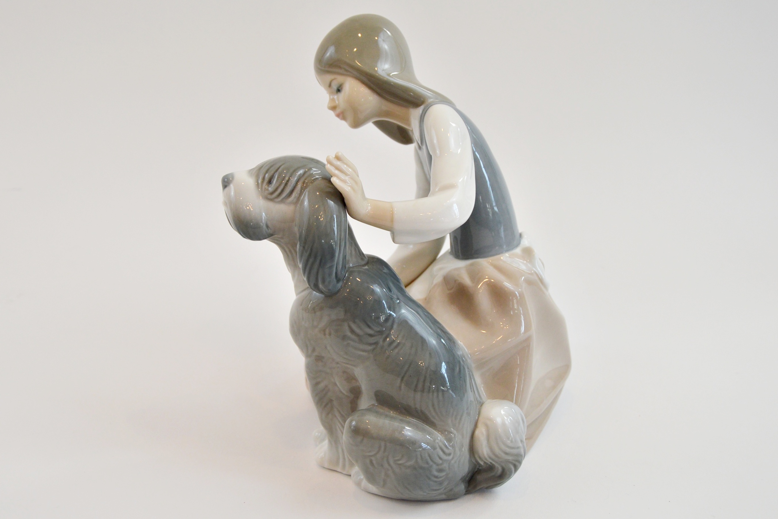 Lladro "Girl Feeding Dog"