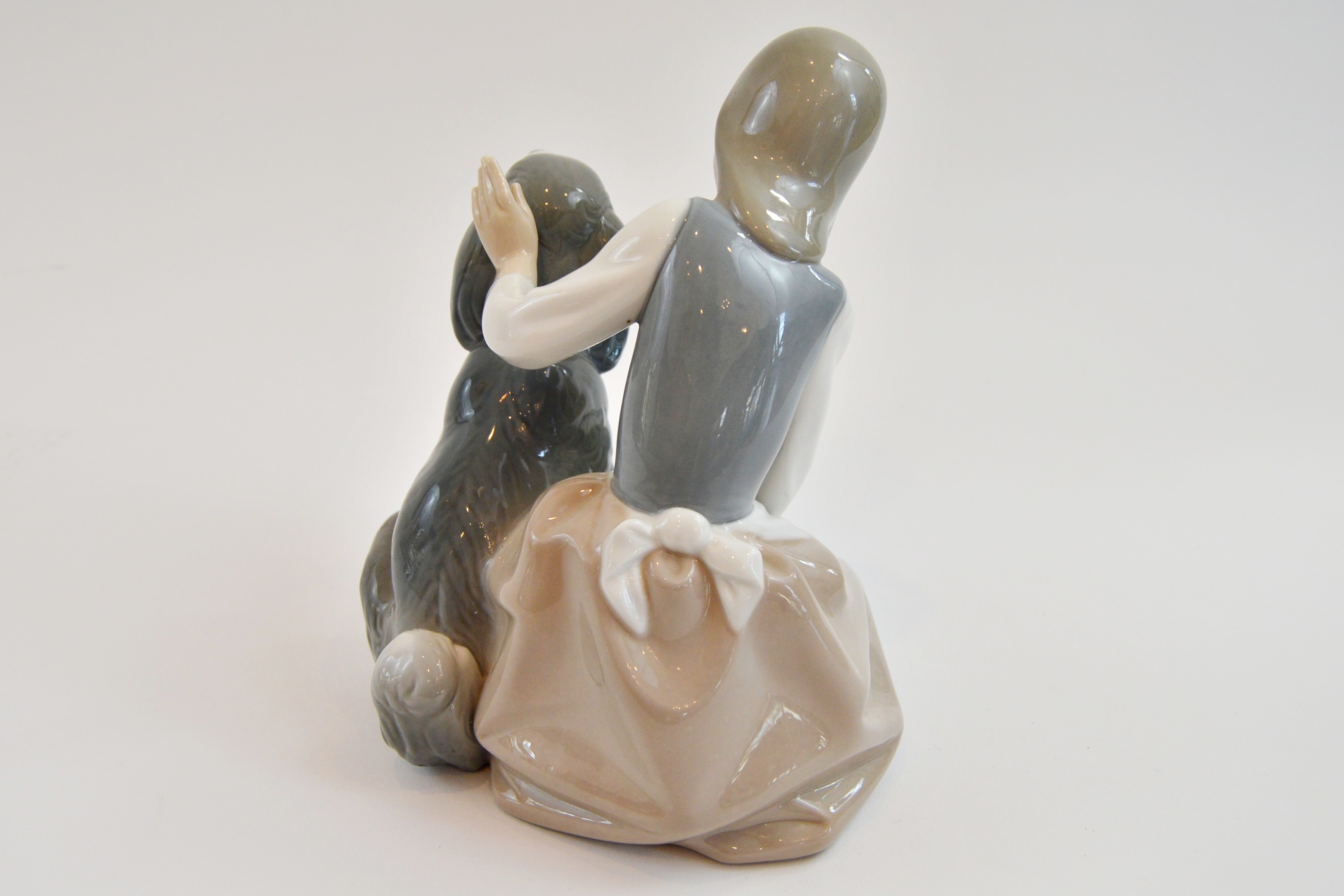 Lladro "Girl Feeding Dog"