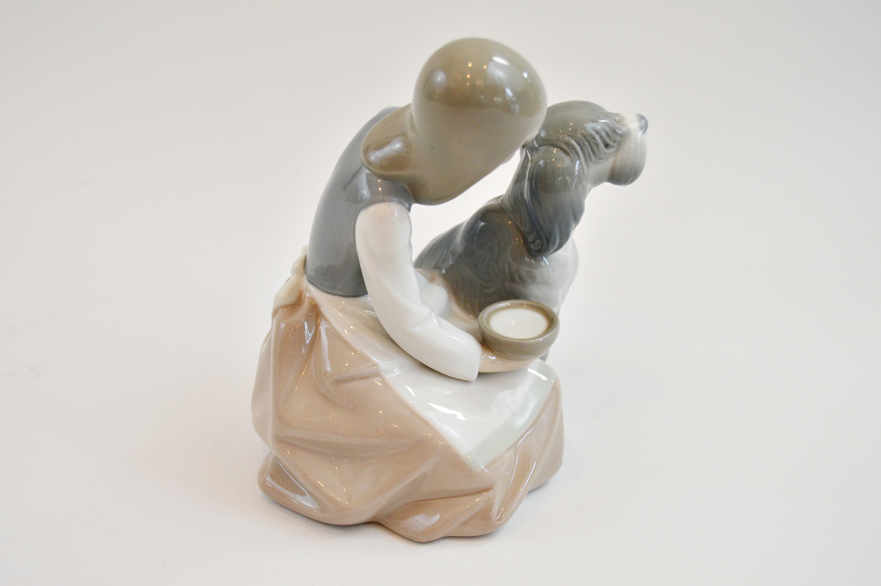 Lladro "Girl Feeding Dog"