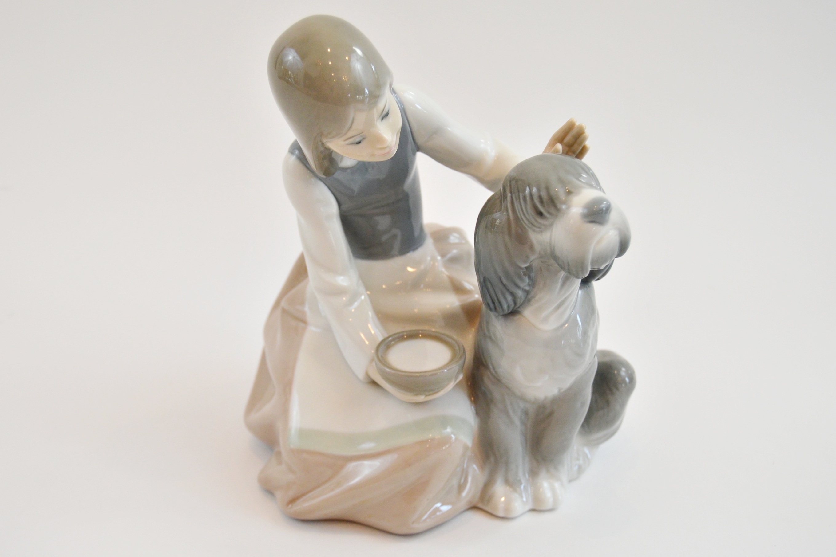 Lladro "Girl Feeding Dog"