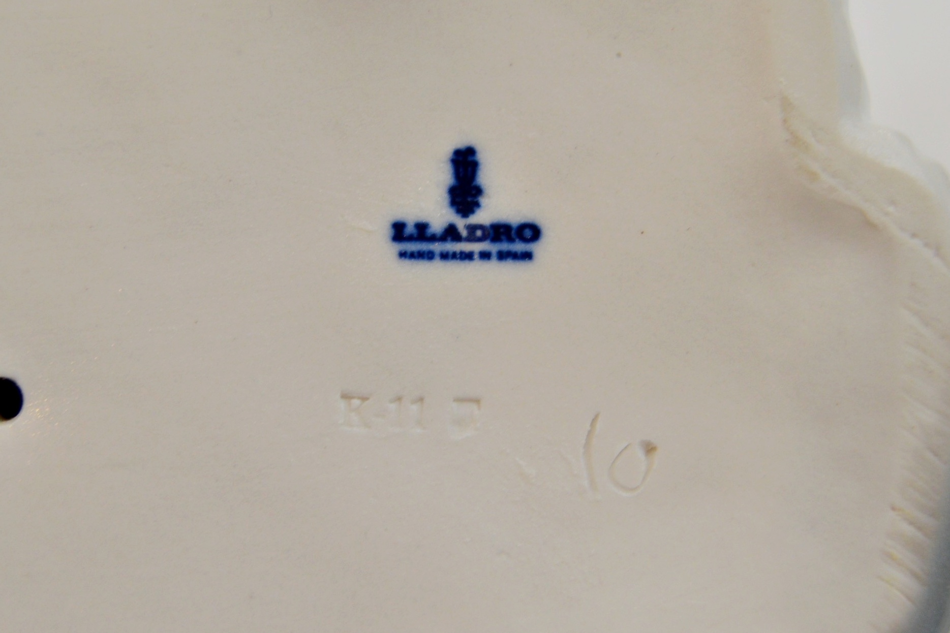 Lladro "Girl Feeding Dog"