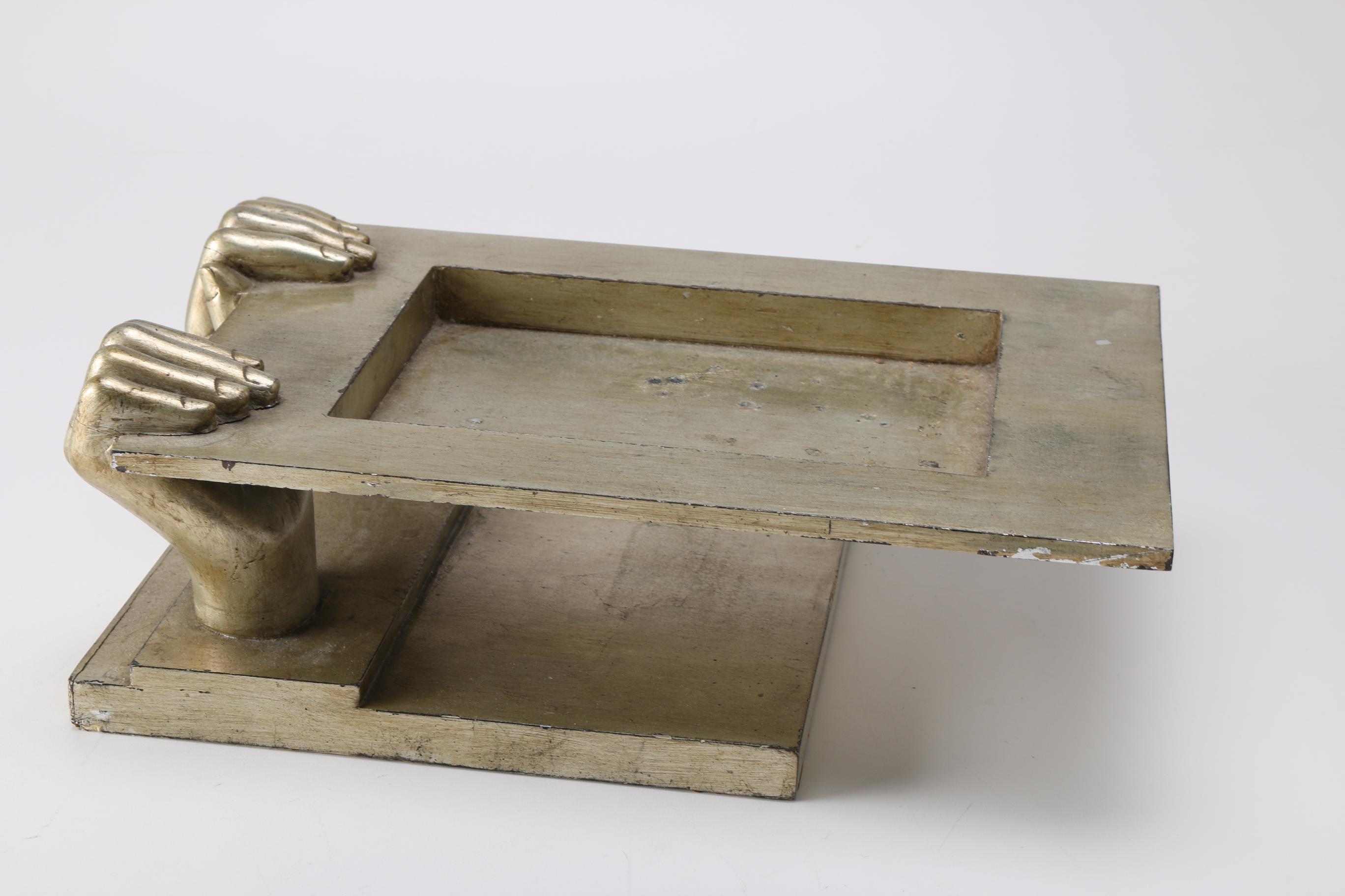 Sculptural Tray Suspended by Molded Hands