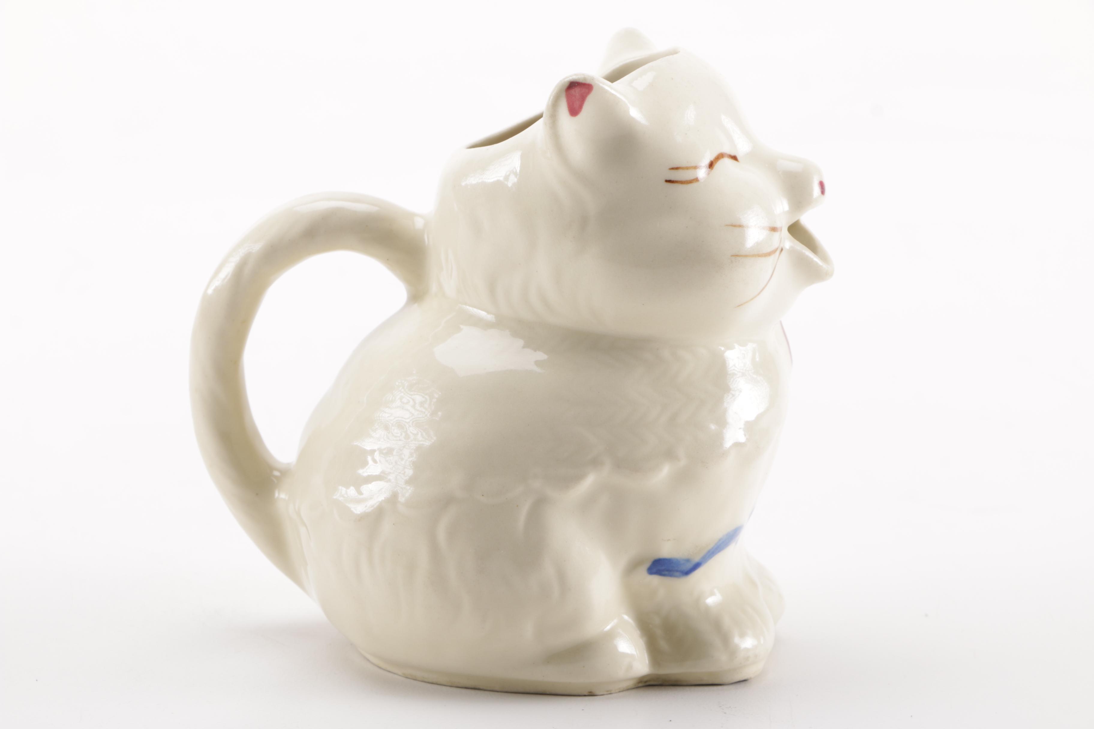 Vintage Figural Pottery Vessels Including Shawnee