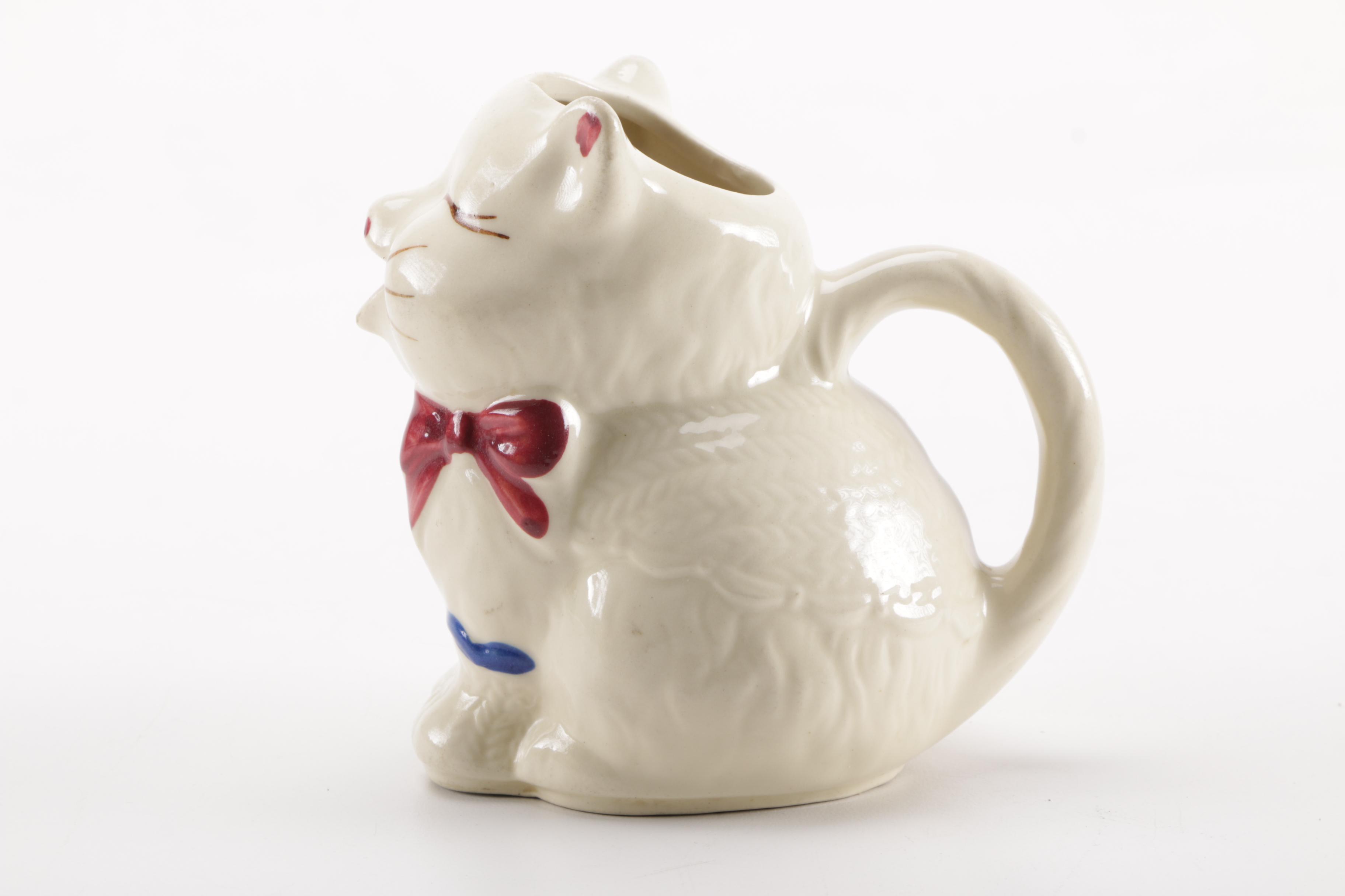 Vintage Figural Pottery Vessels Including Shawnee