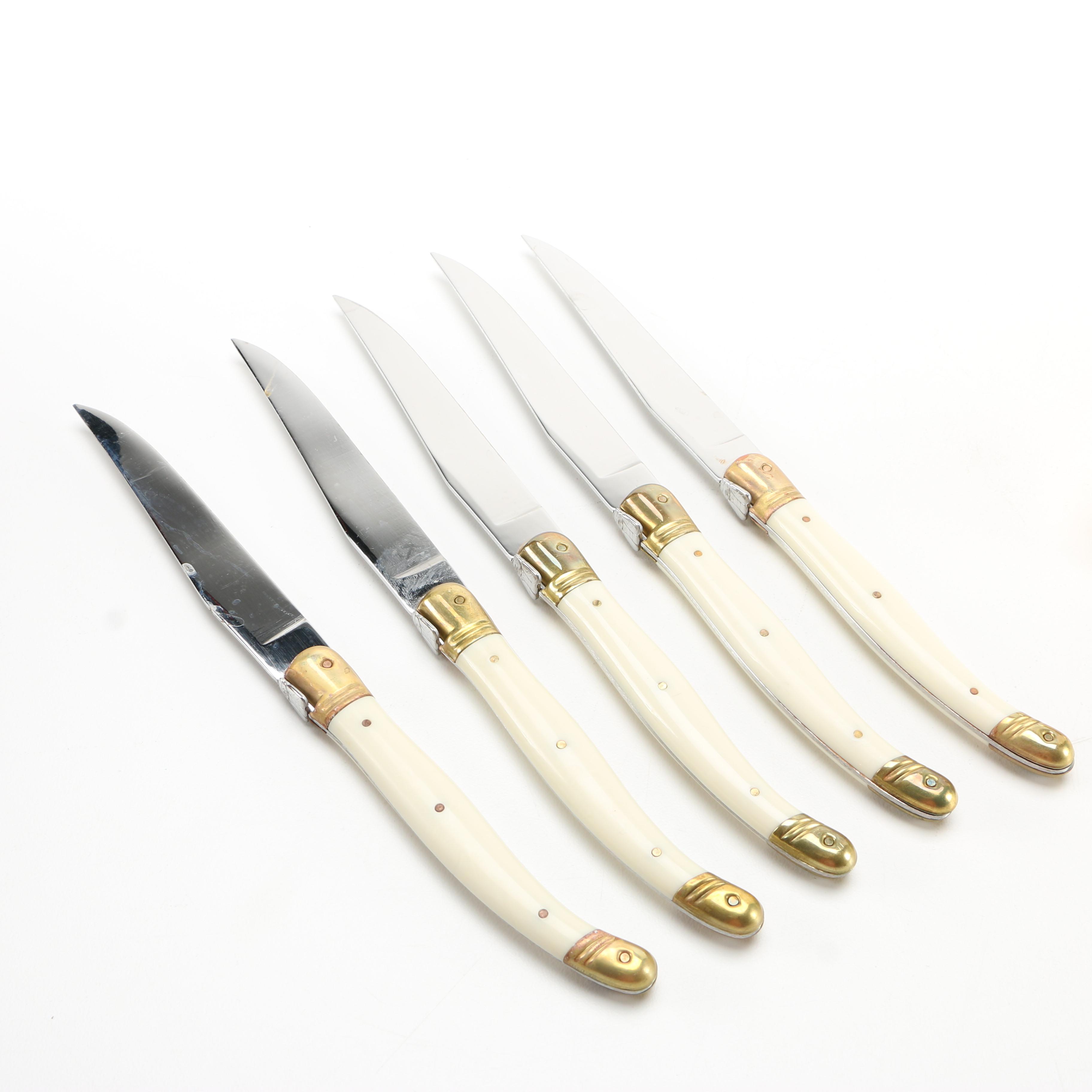 International Silver "Golden American Chippendale" and Jean Dubost "Laguiole" Flatware