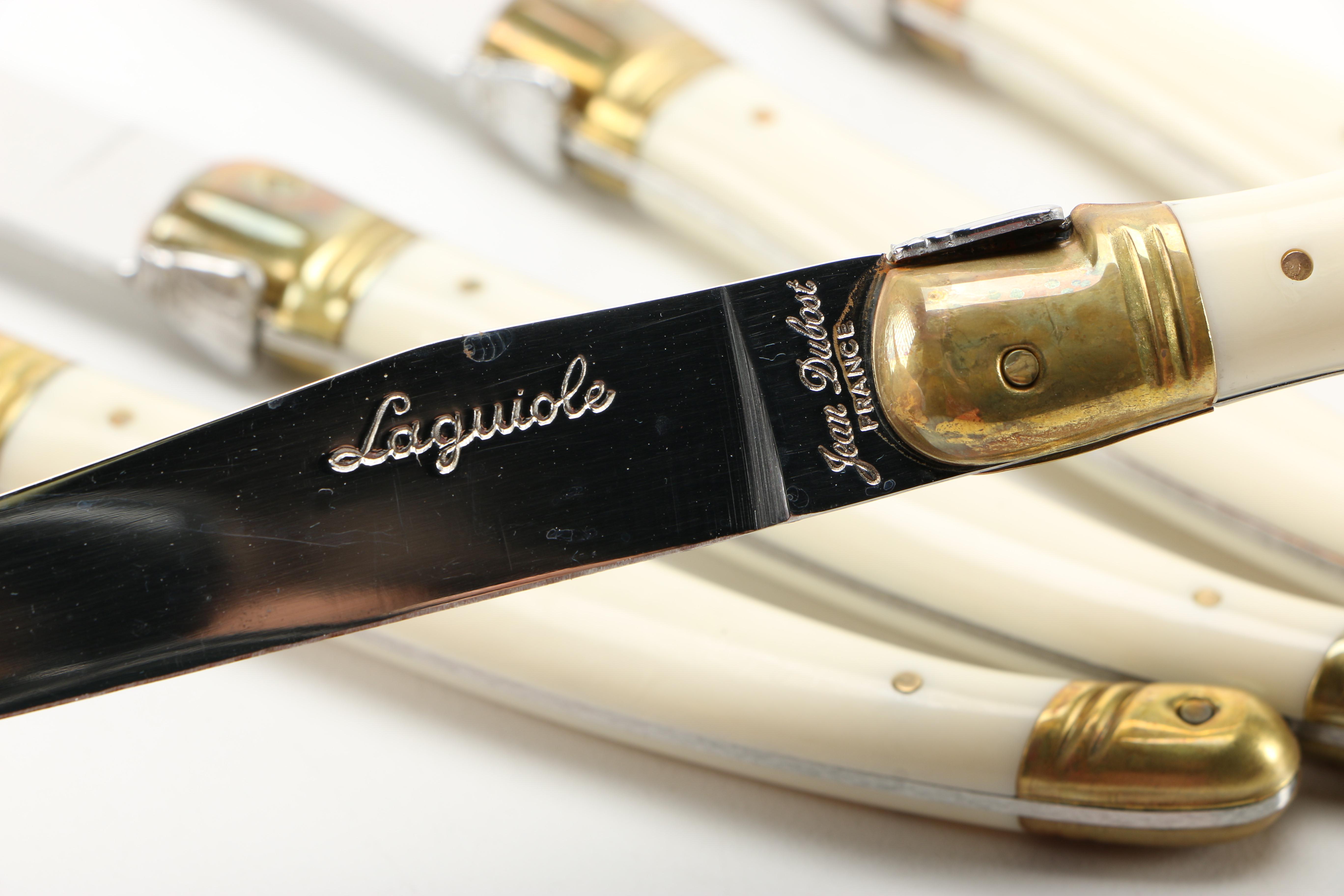 International Silver "Golden American Chippendale" and Jean Dubost "Laguiole" Flatware