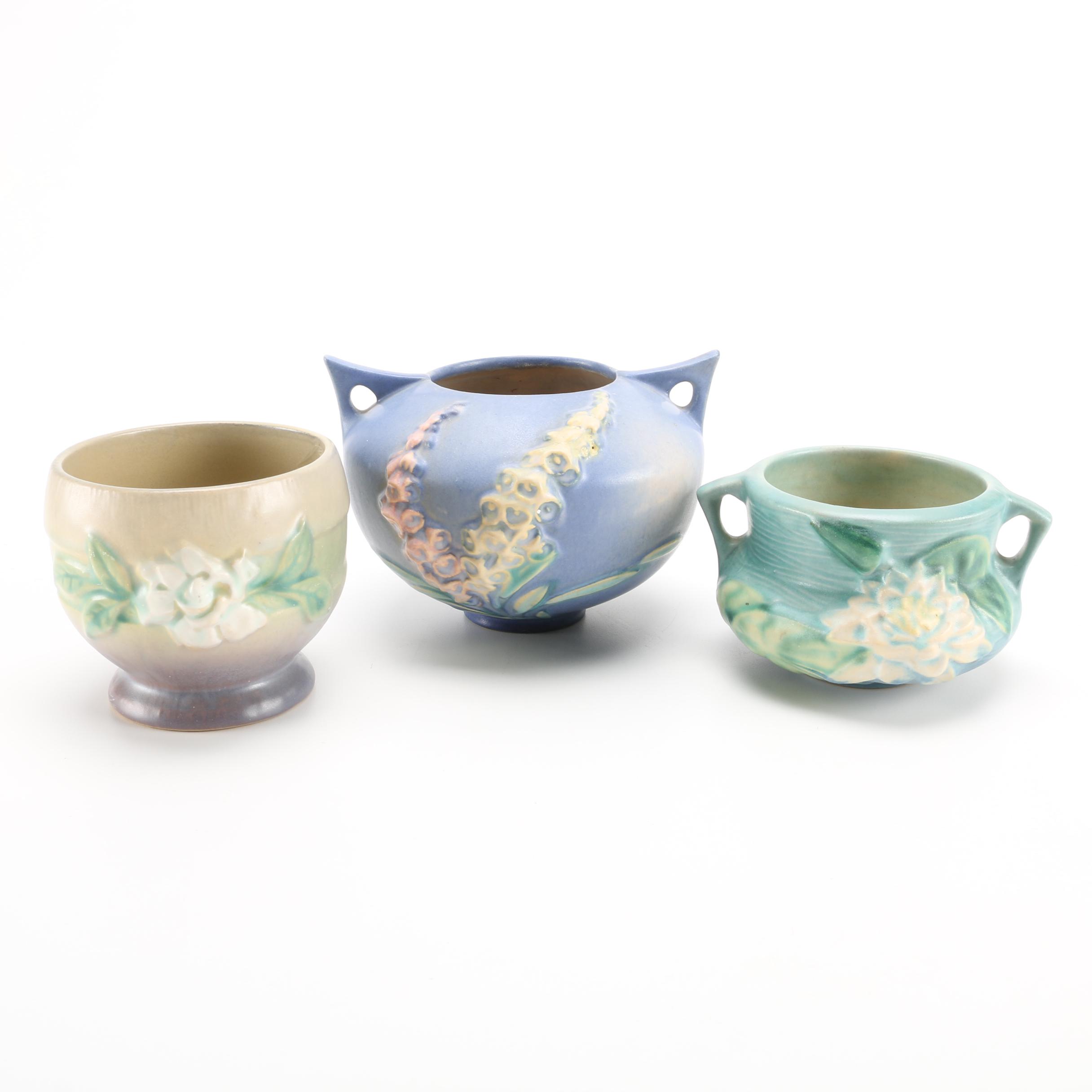 Roseville Pottery "White Rose", "Foxglove" and "White Lily" Vessels