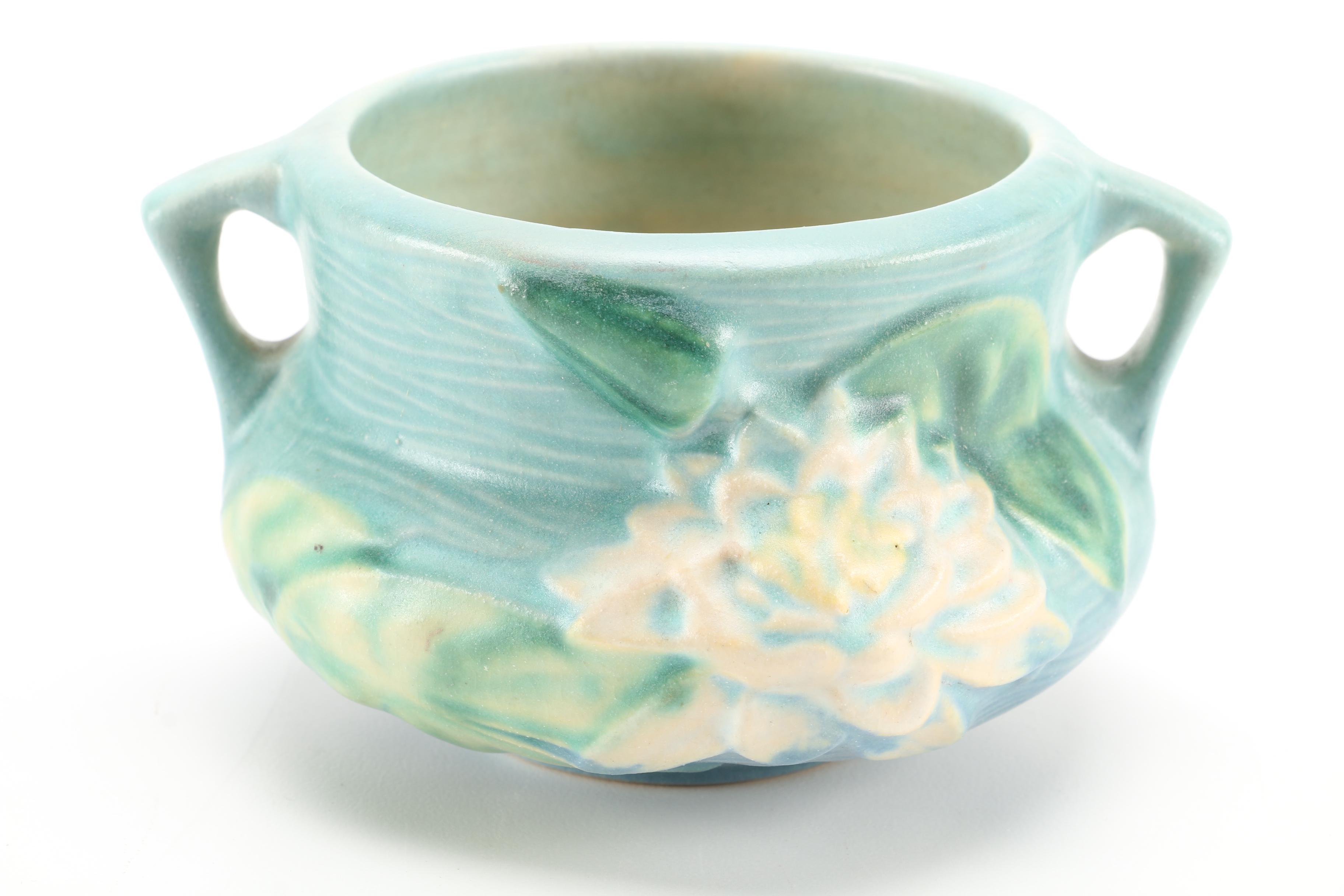 Roseville Pottery "White Rose", "Foxglove" and "White Lily" Vessels