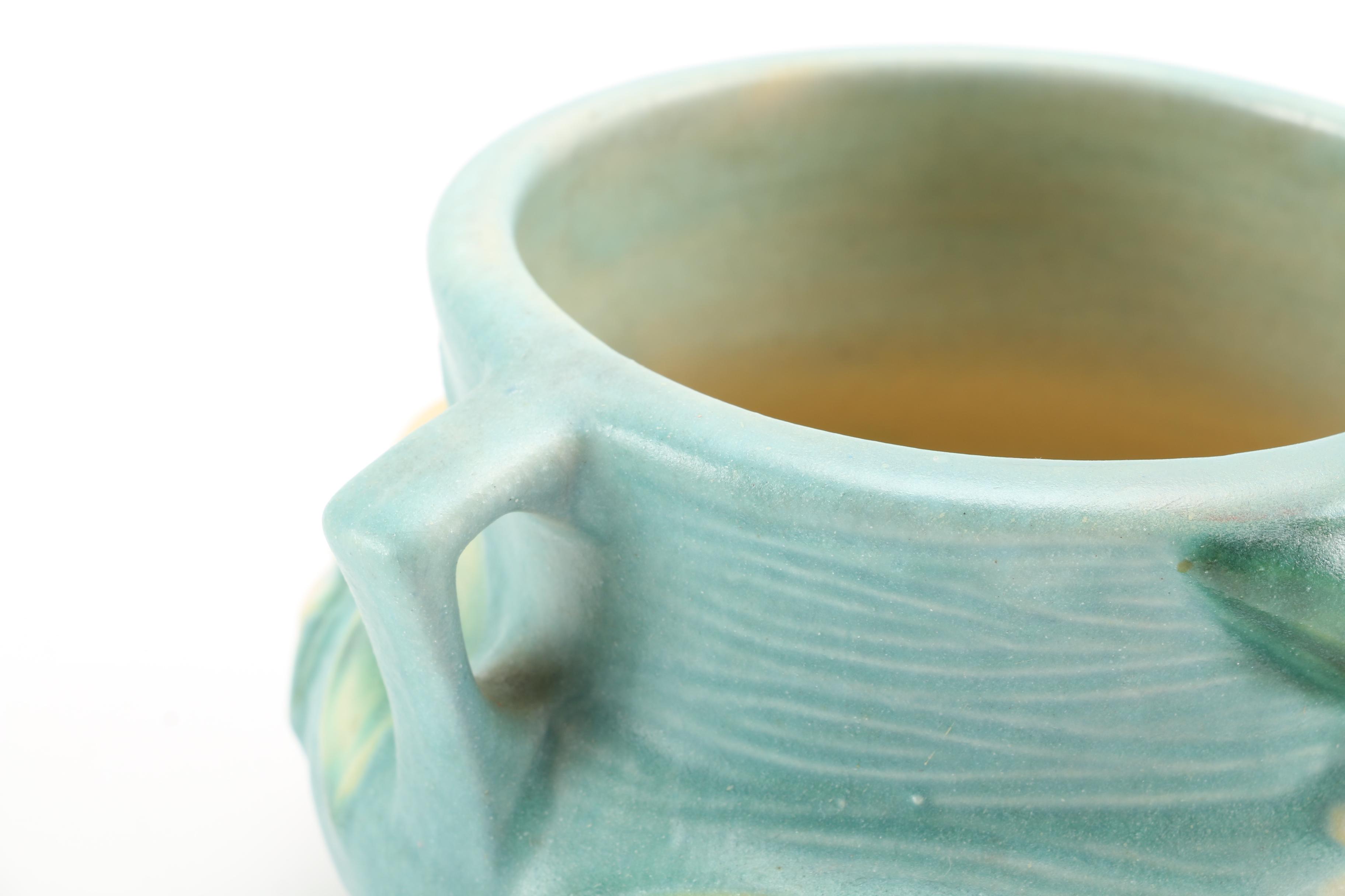 Roseville Pottery "White Rose", "Foxglove" and "White Lily" Vessels