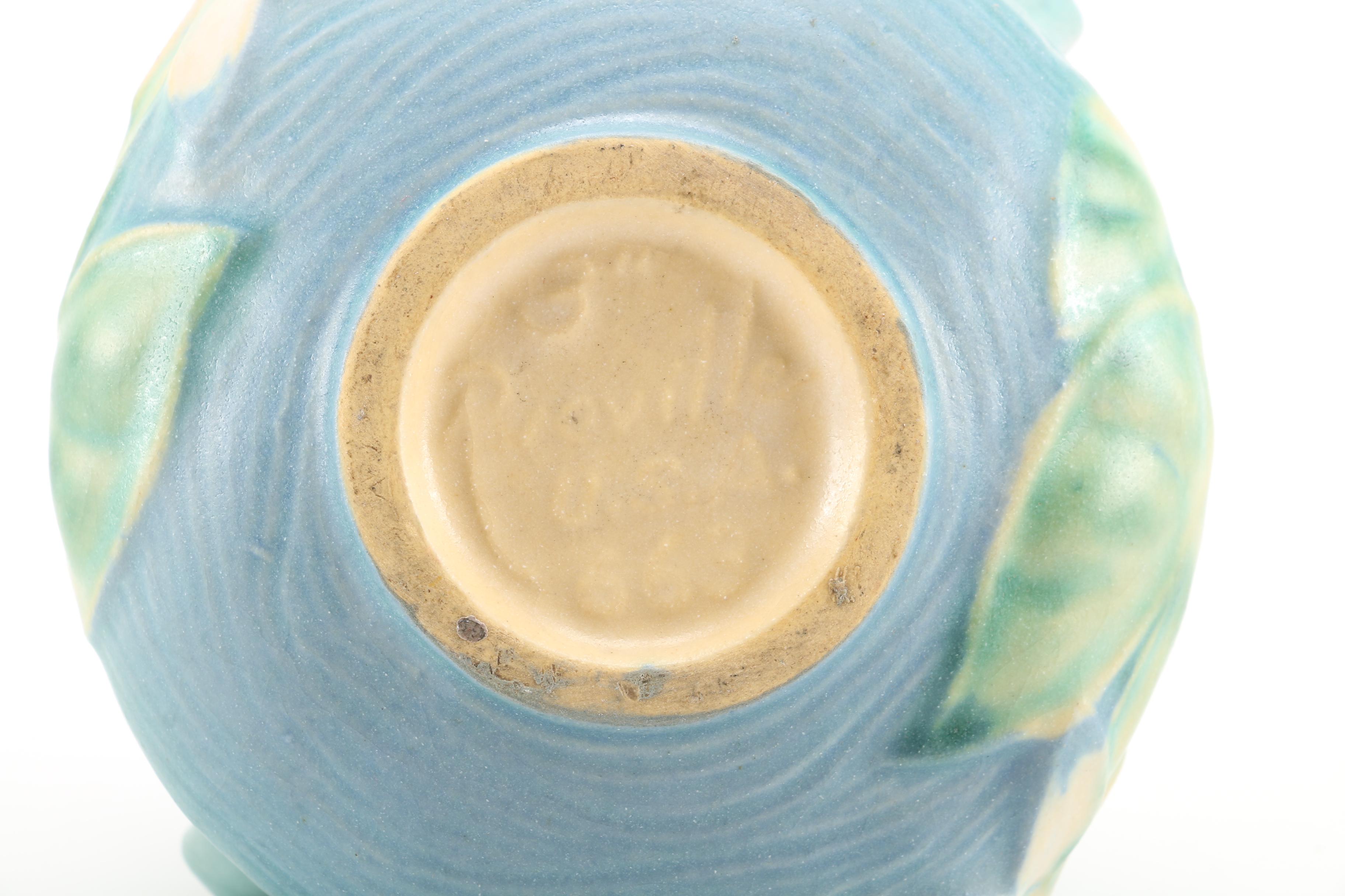 Roseville Pottery "White Rose", "Foxglove" and "White Lily" Vessels