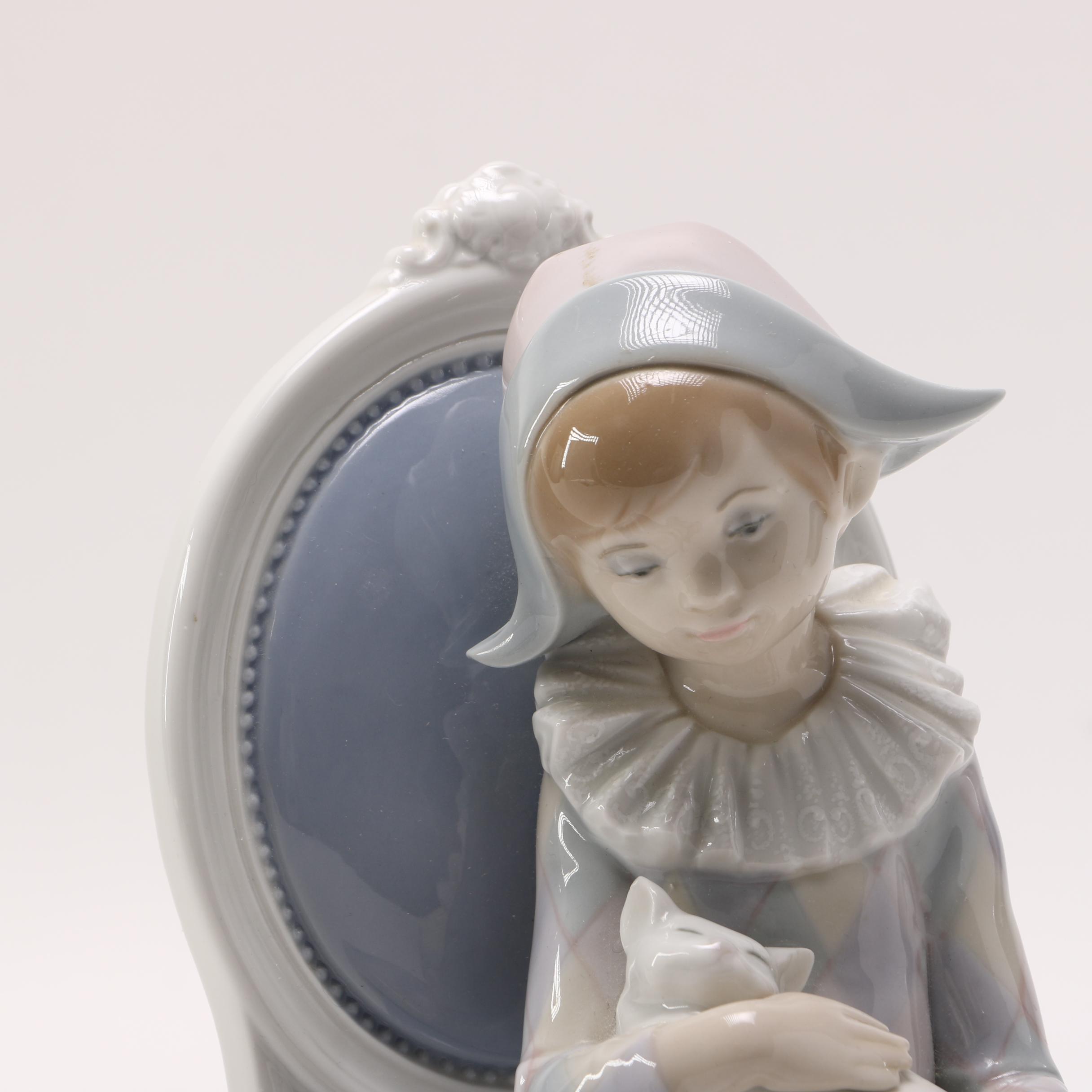 Lladró Young Harlequin Boy in a Chair with a Cat Figurine