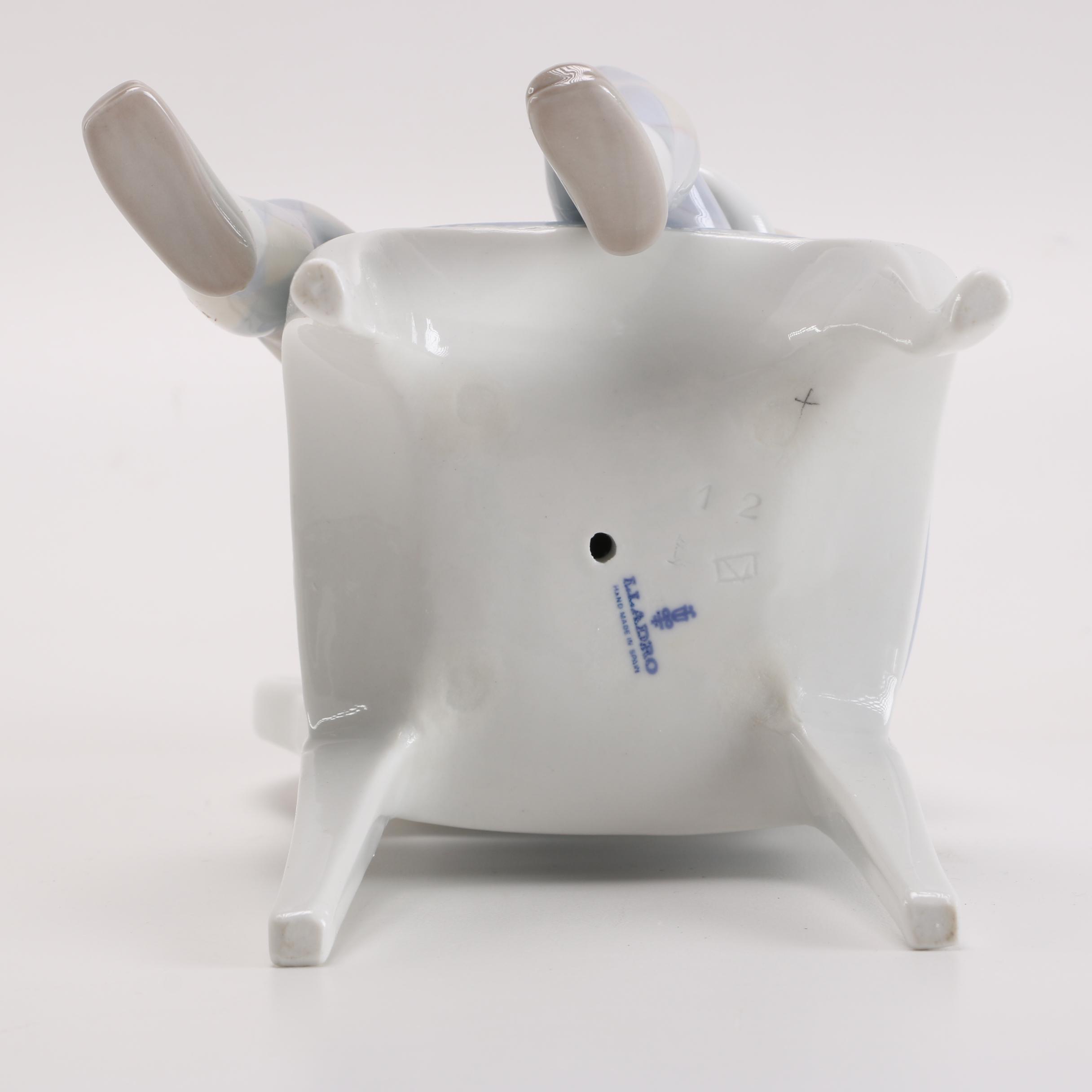 Lladró Young Harlequin Boy in a Chair with a Cat Figurine