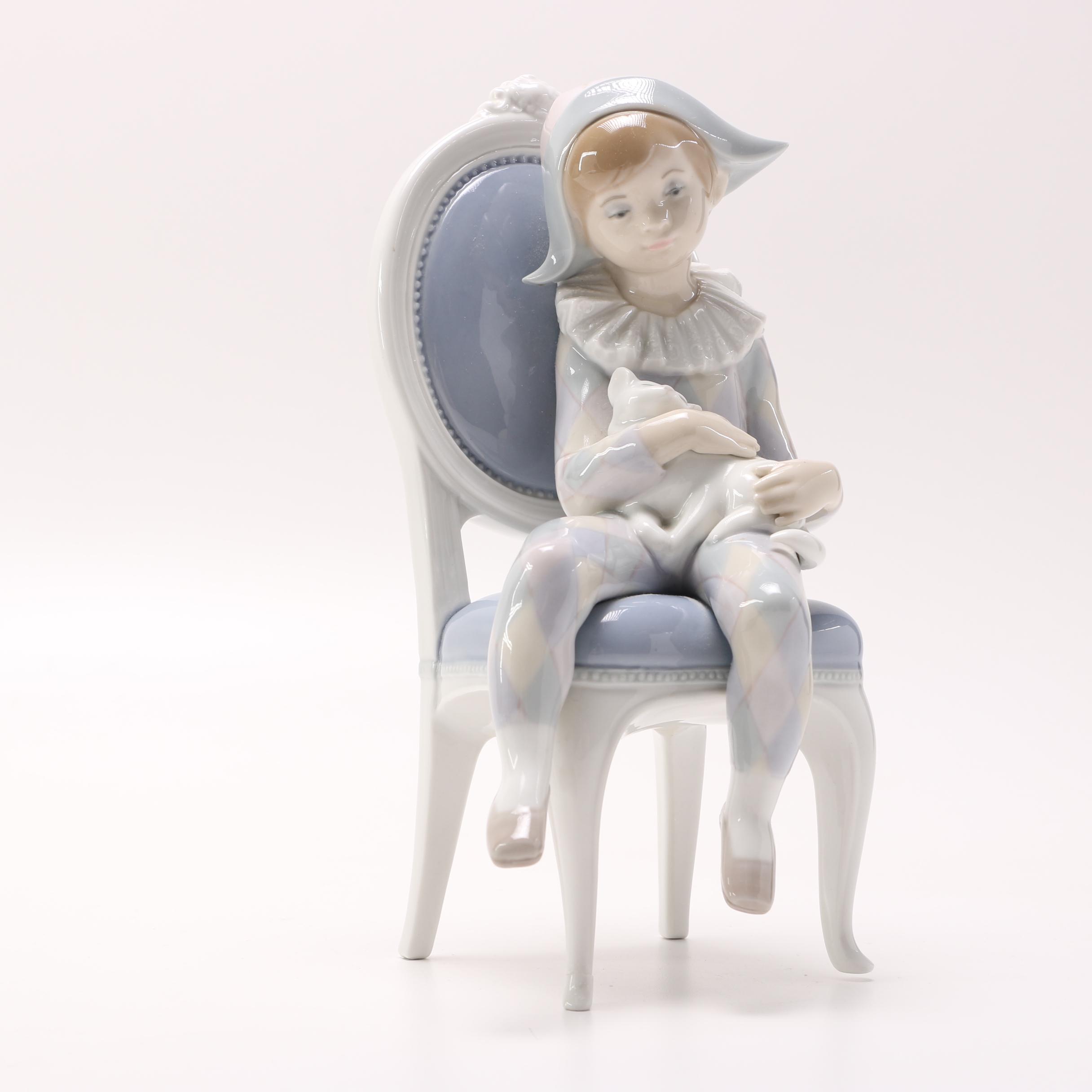 Lladró Young Harlequin Boy in a Chair with a Cat Figurine