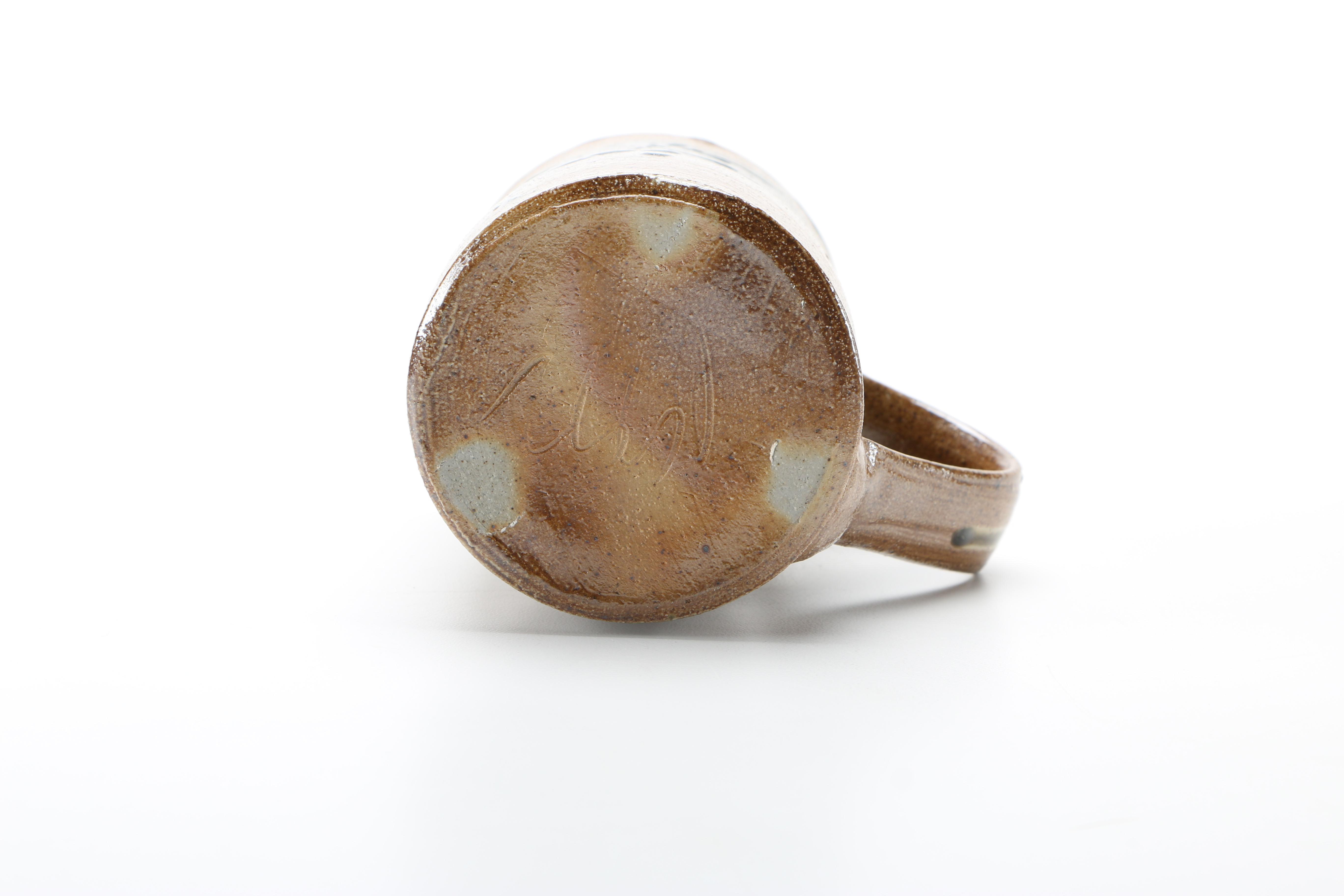 Decorative Earthenware Vessels and Figural Candle Holder