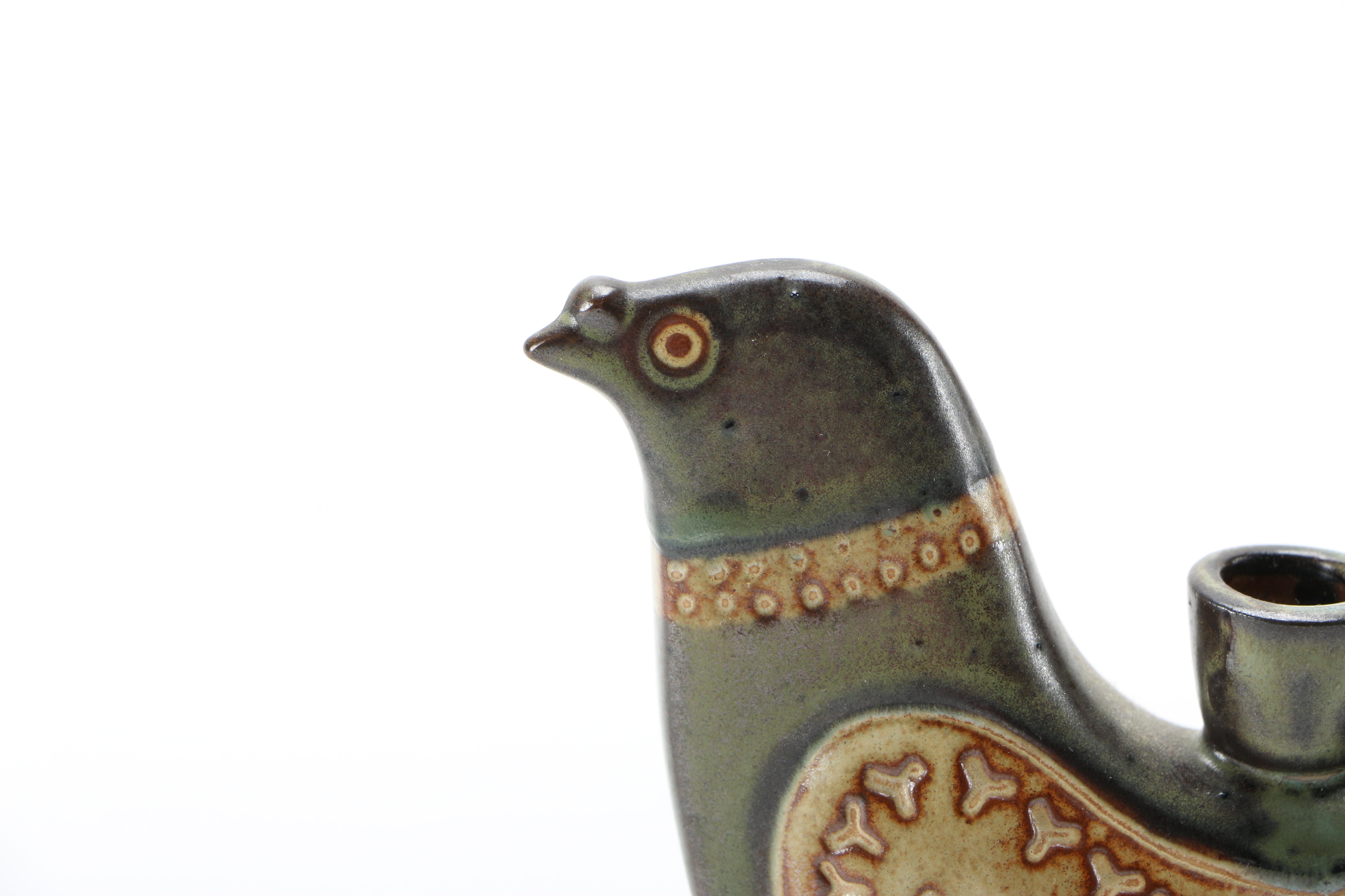 Decorative Earthenware Vessels and Figural Candle Holder