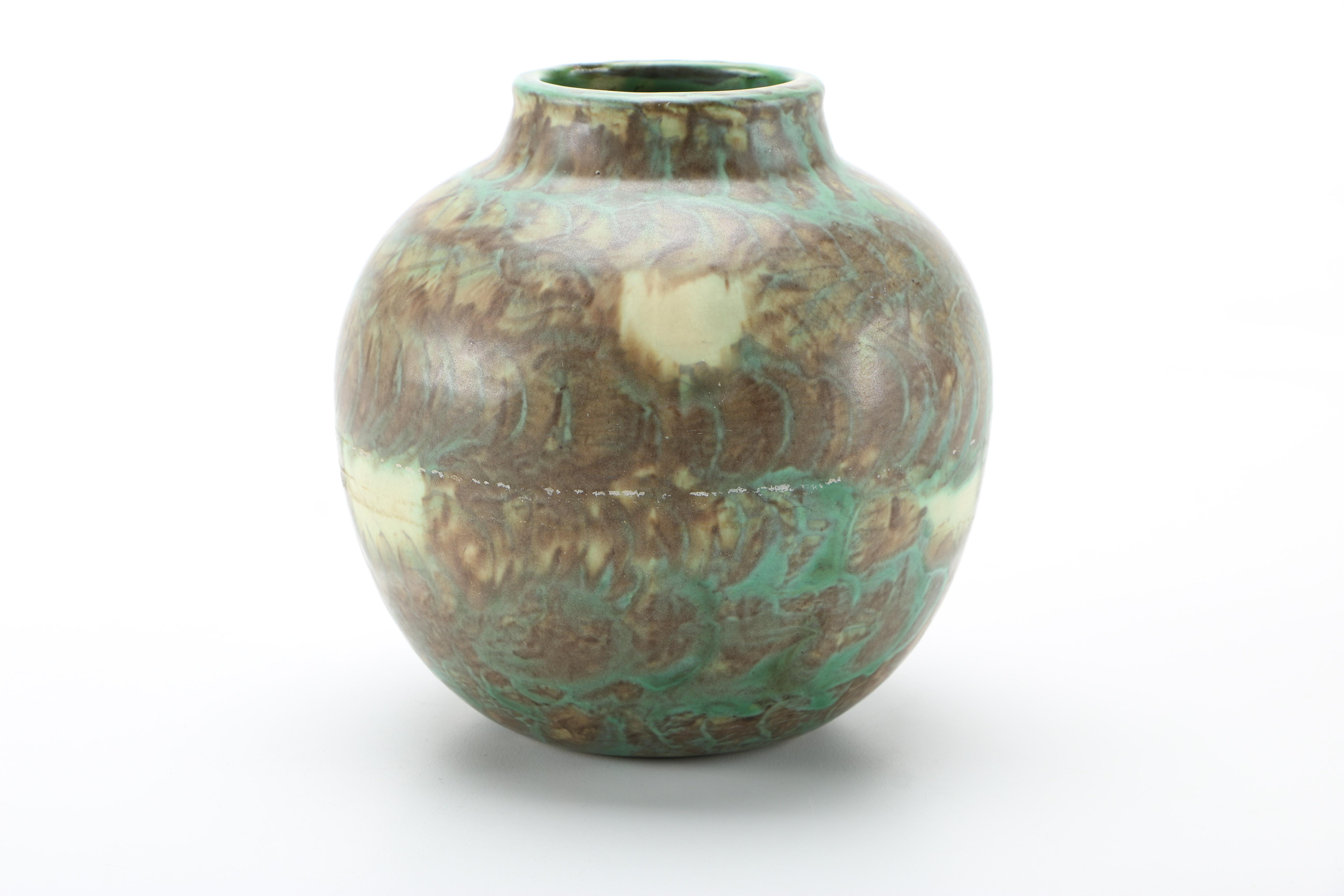 Decorative Earthenware Vessels and Figural Candle Holder