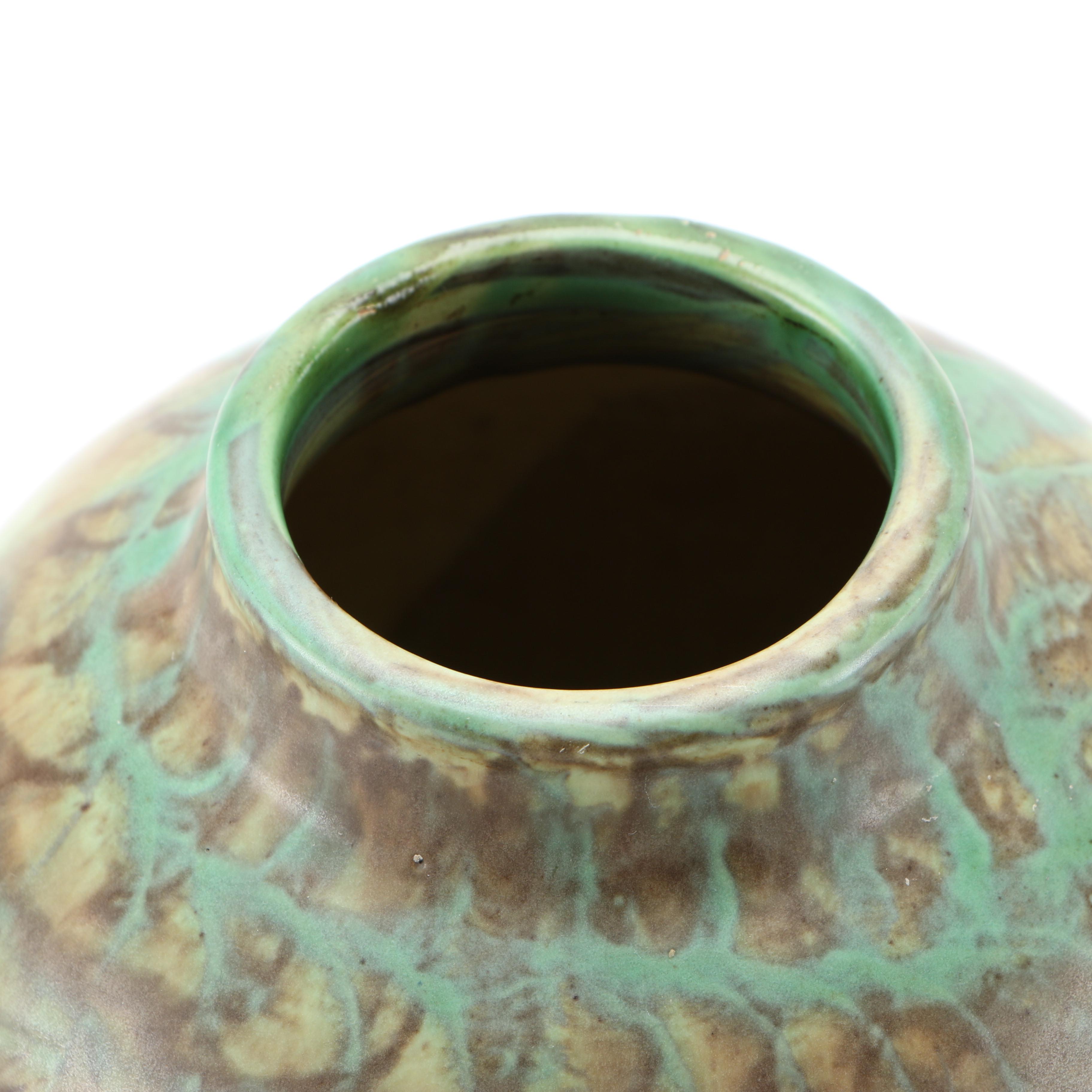 Decorative Earthenware Vessels and Figural Candle Holder