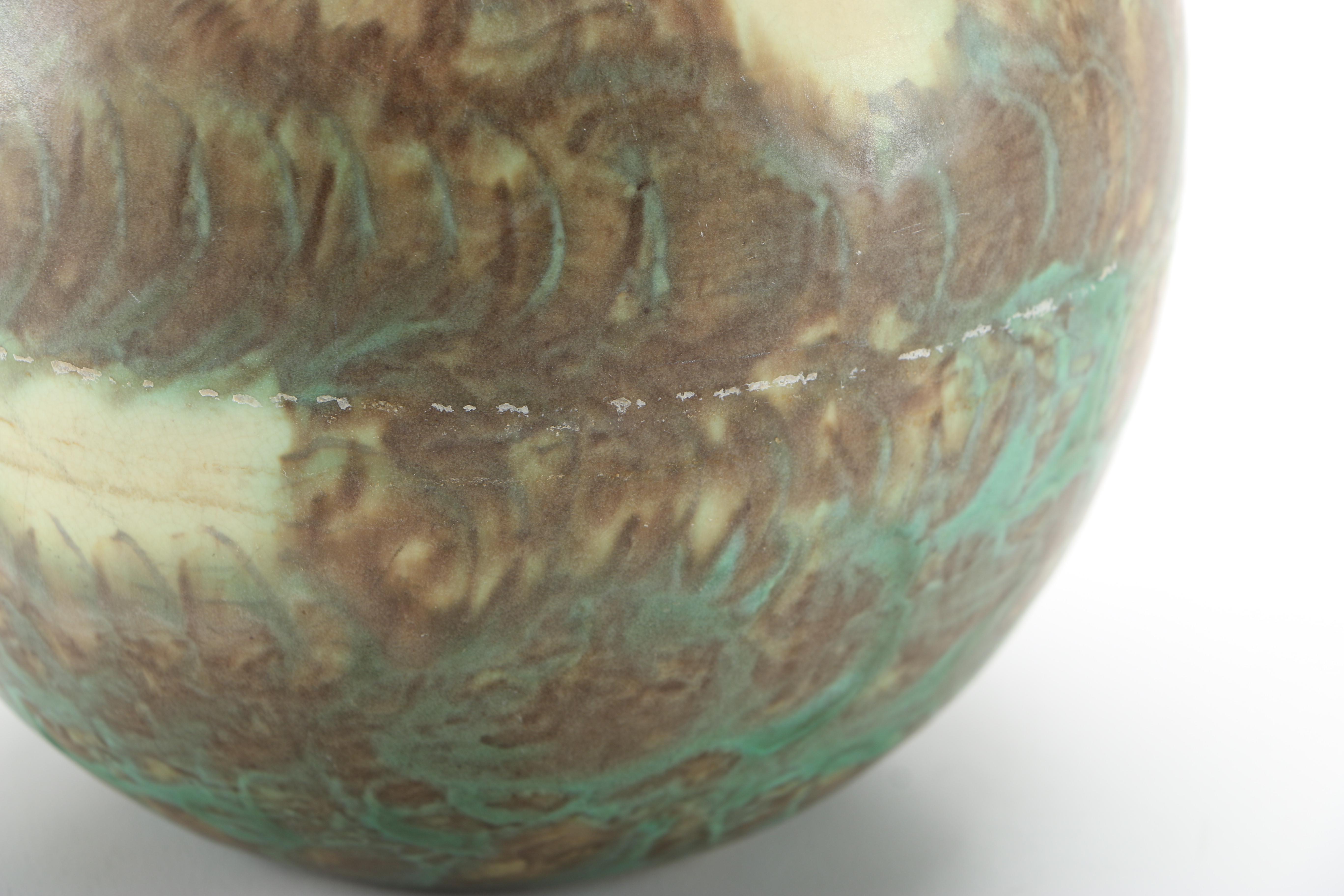 Decorative Earthenware Vessels and Figural Candle Holder