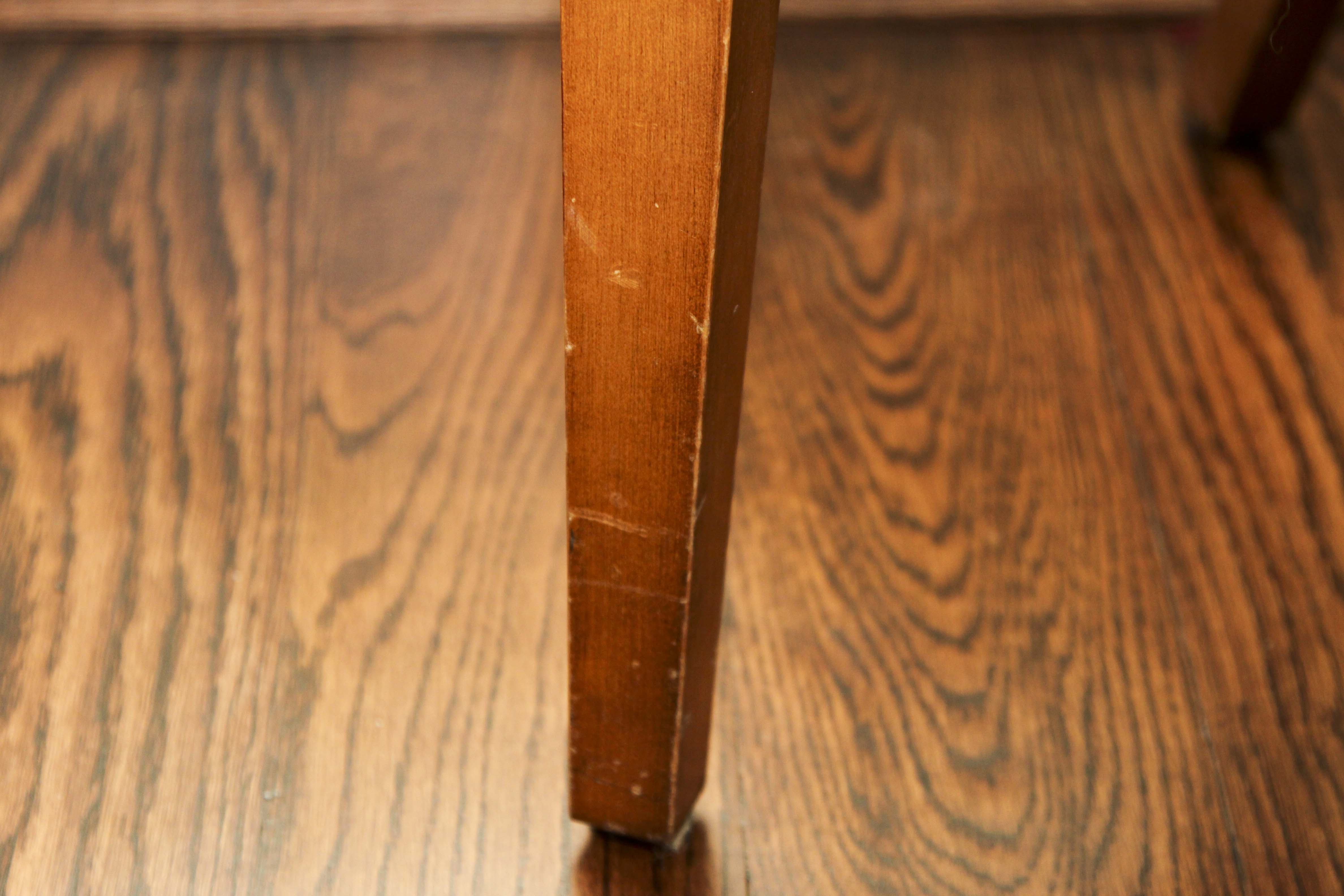 A Pair of Leather Captains Chairs