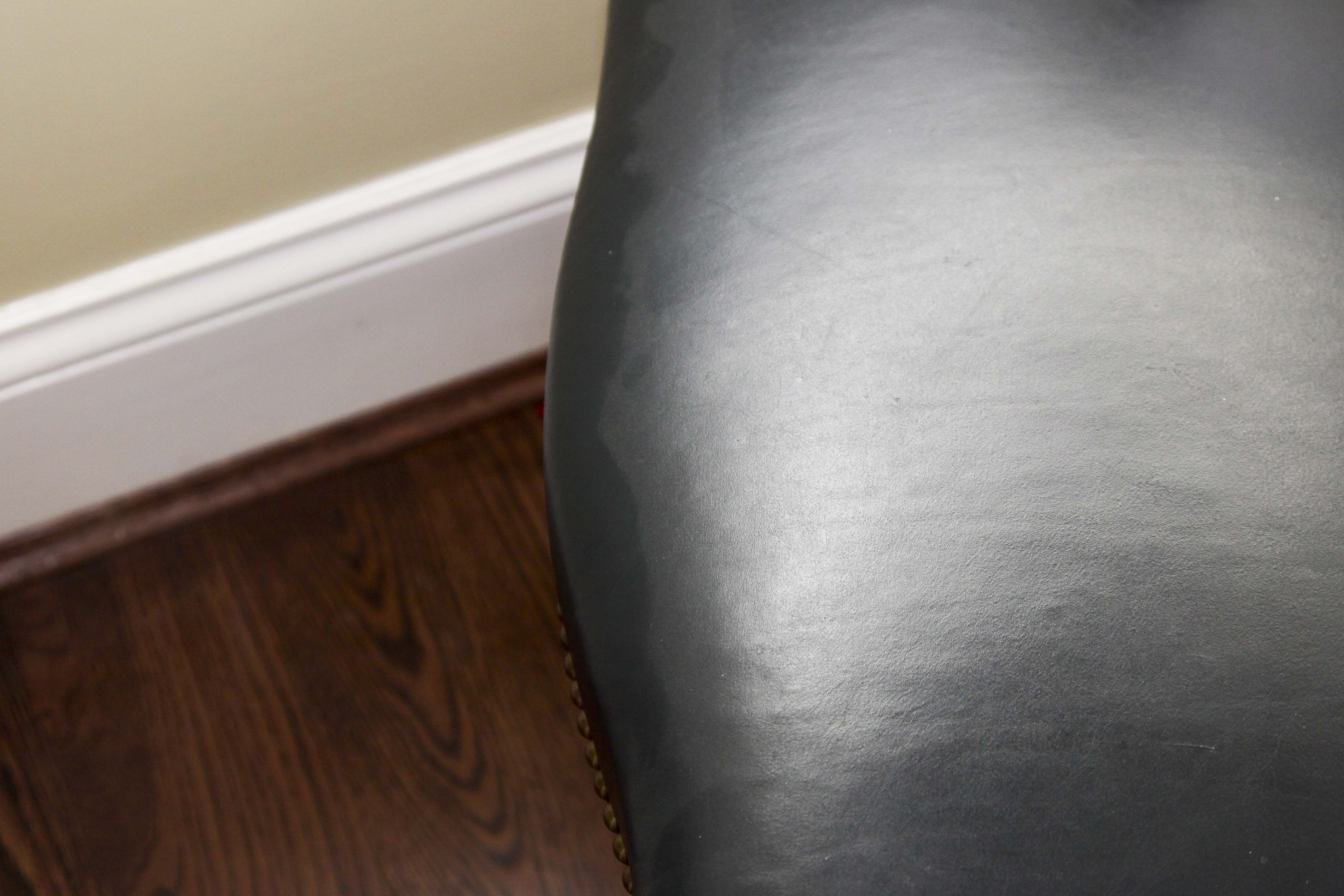 A Pair of Leather Captains Chairs