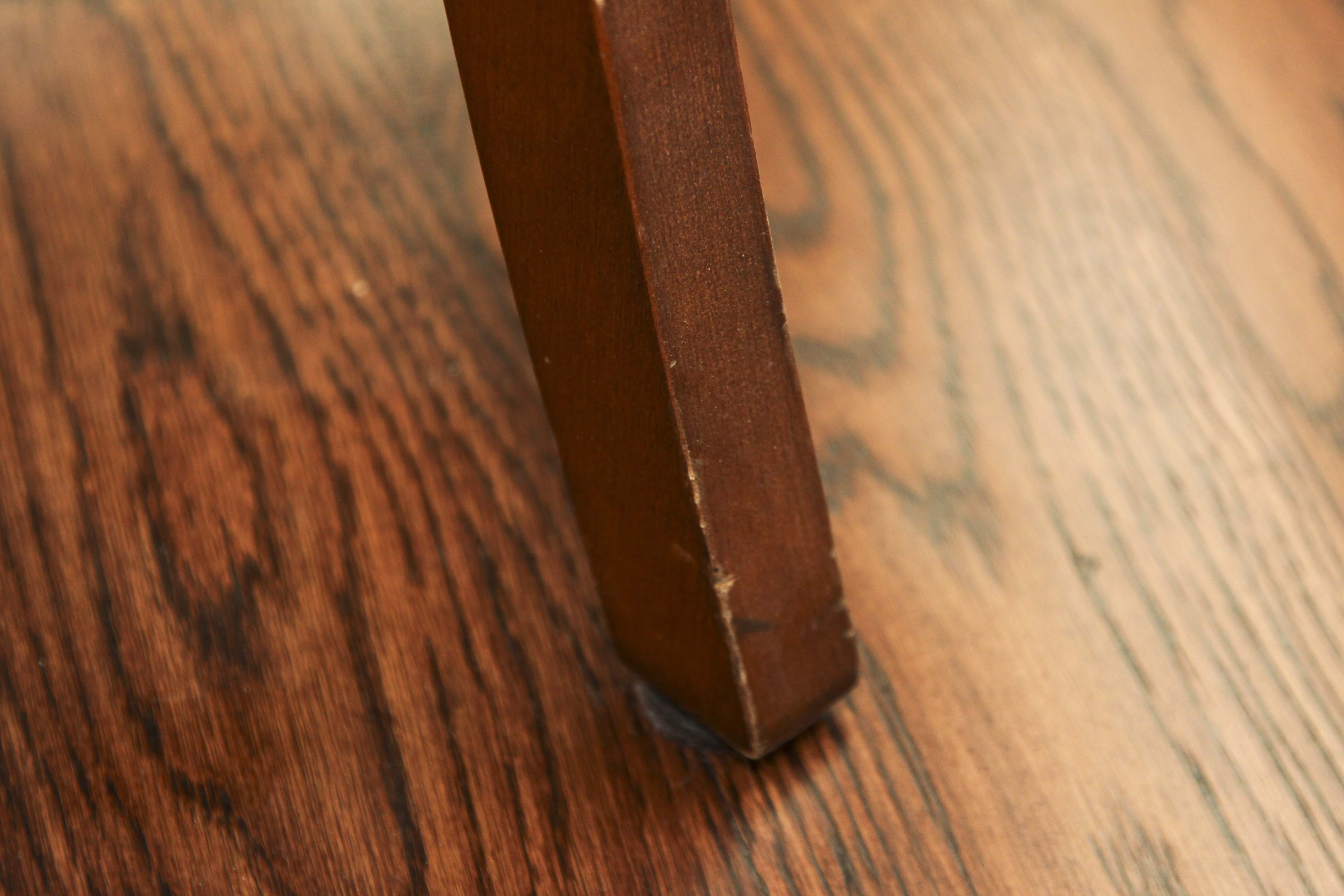 A Pair of Leather Captains Chairs