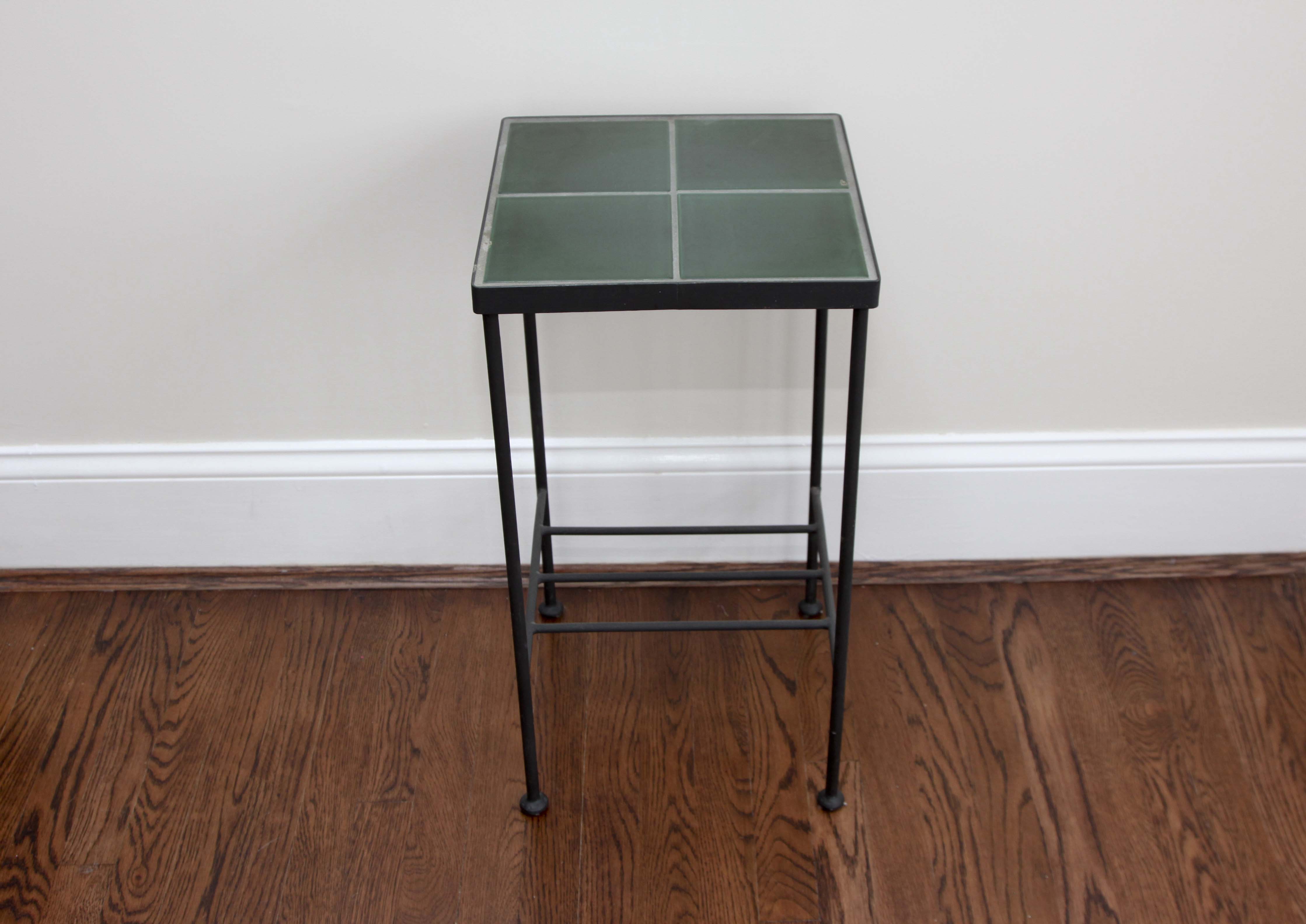A Pair of Tile Top Accent Tables