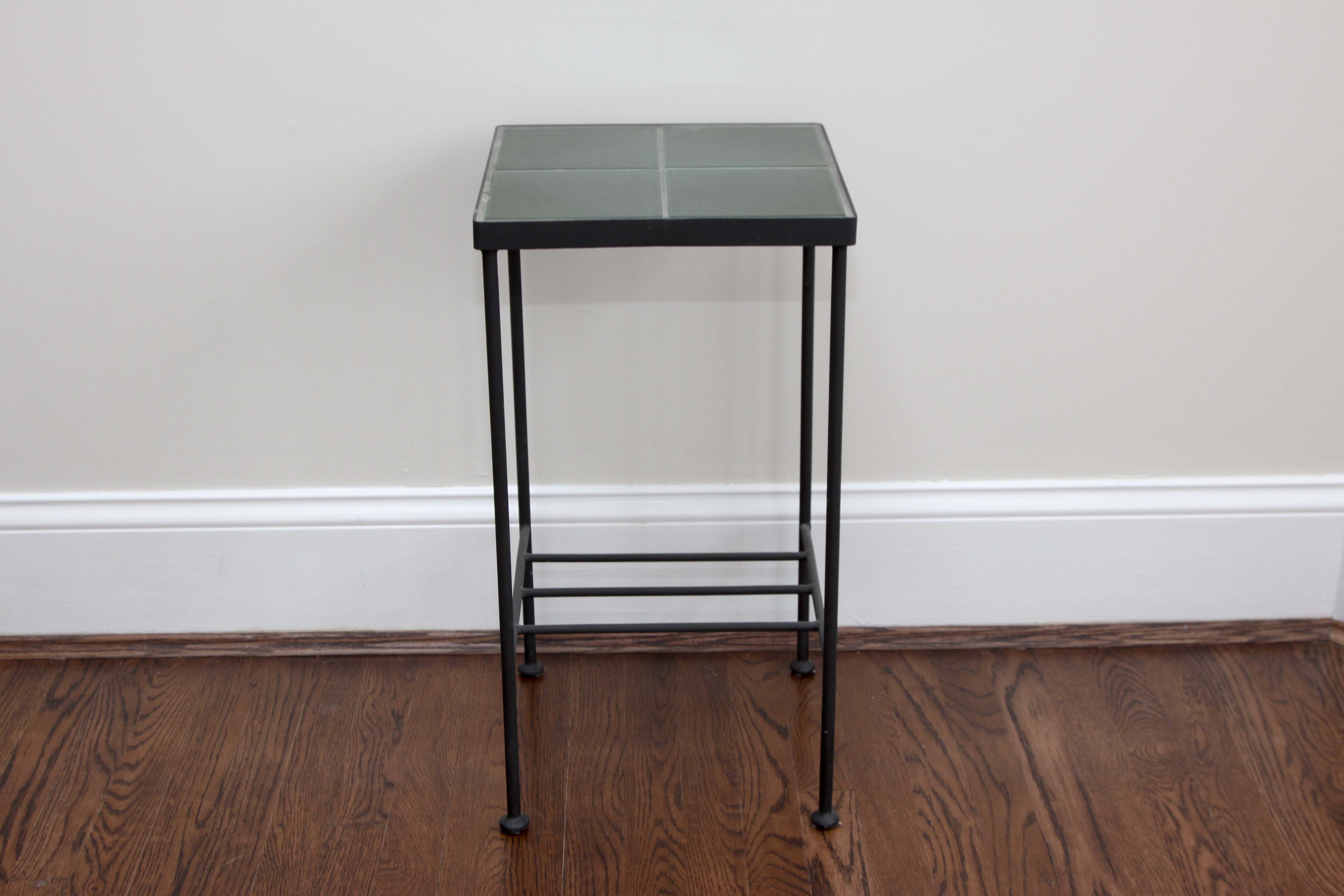 A Pair of Tile Top Accent Tables