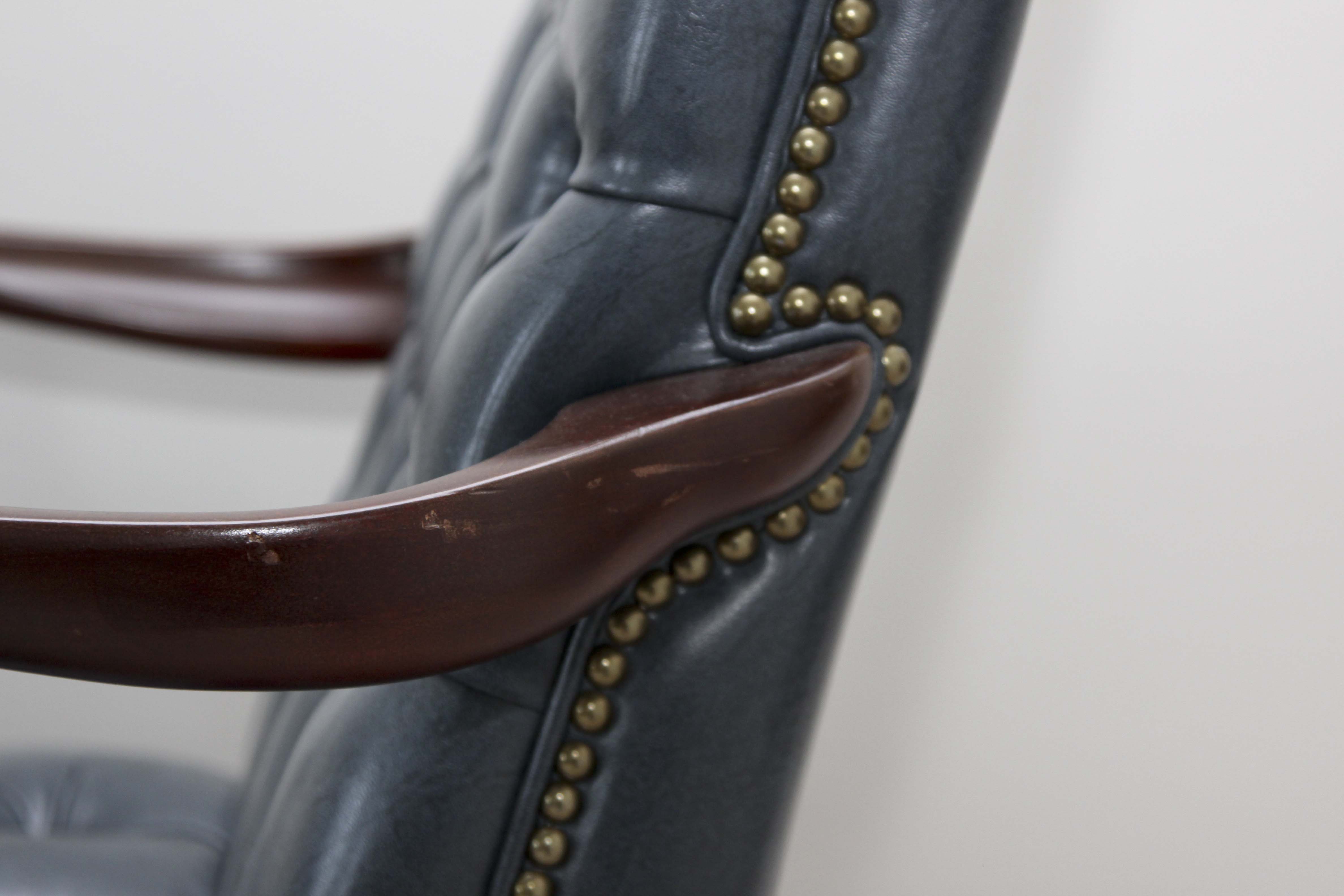 A Pair of Steel Blue Upholstered Tufted Armchairs