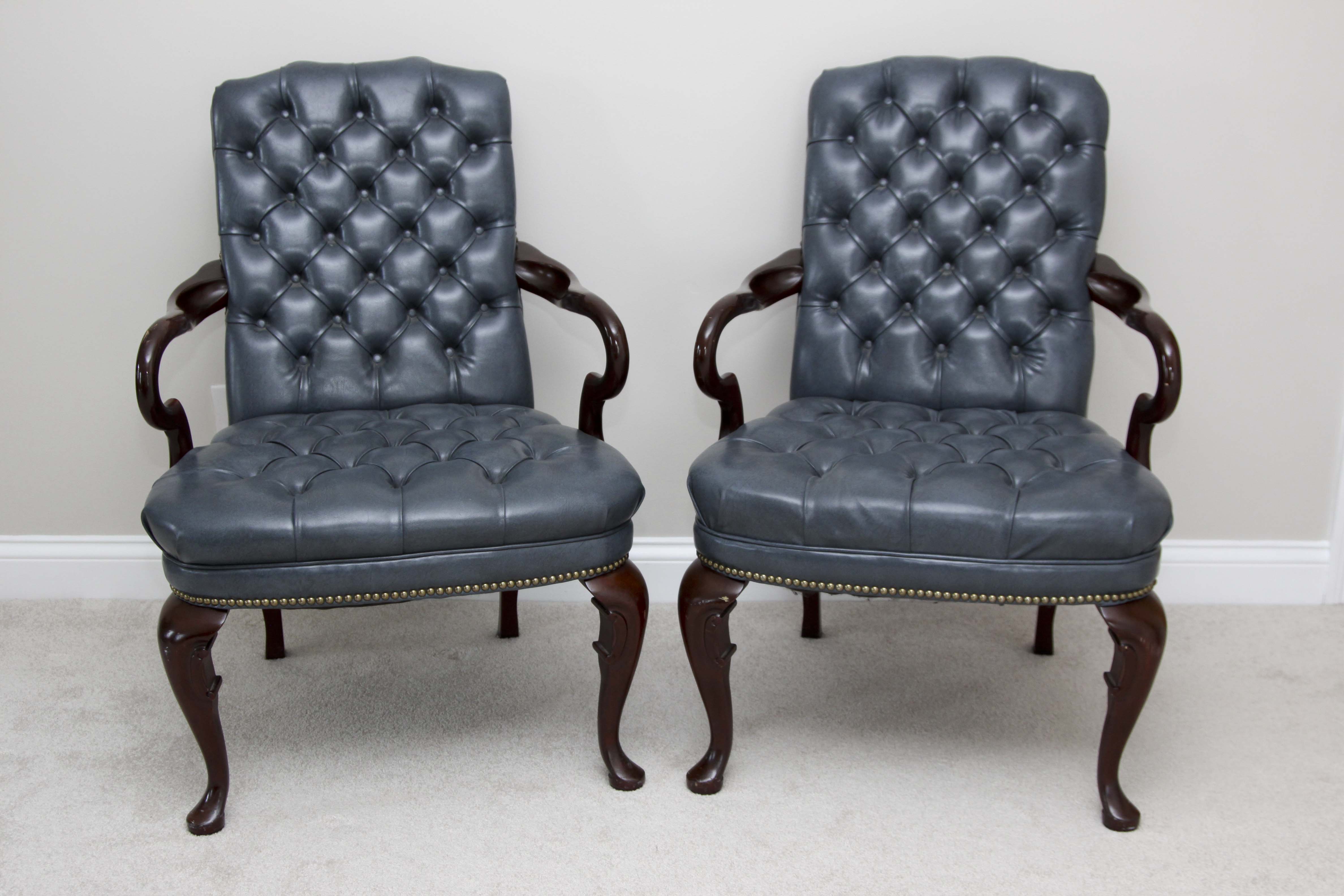A Pair of Steel Blue Upholstered Tufted Chairs