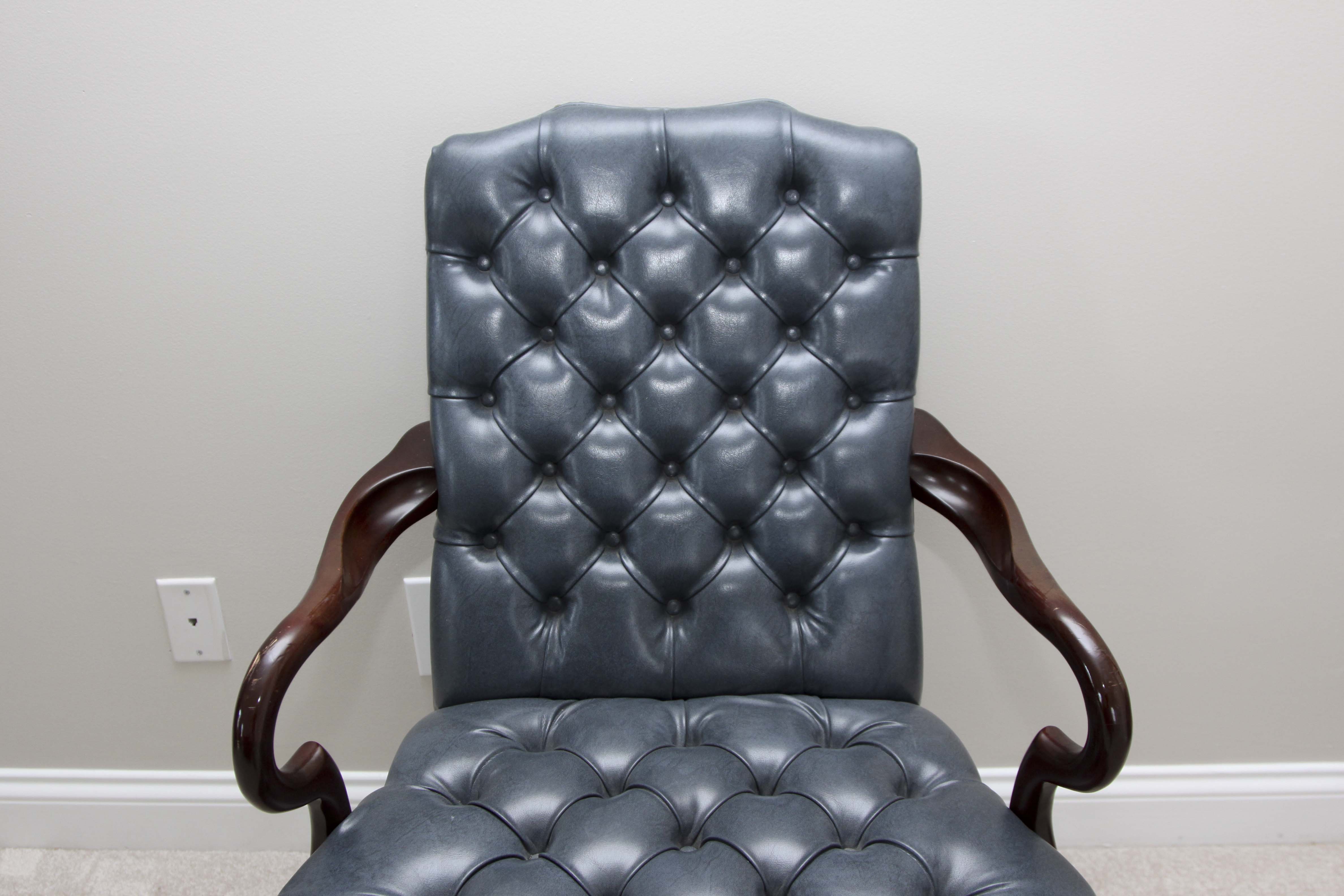 A Pair of Steel Blue Upholstered Tufted Chairs