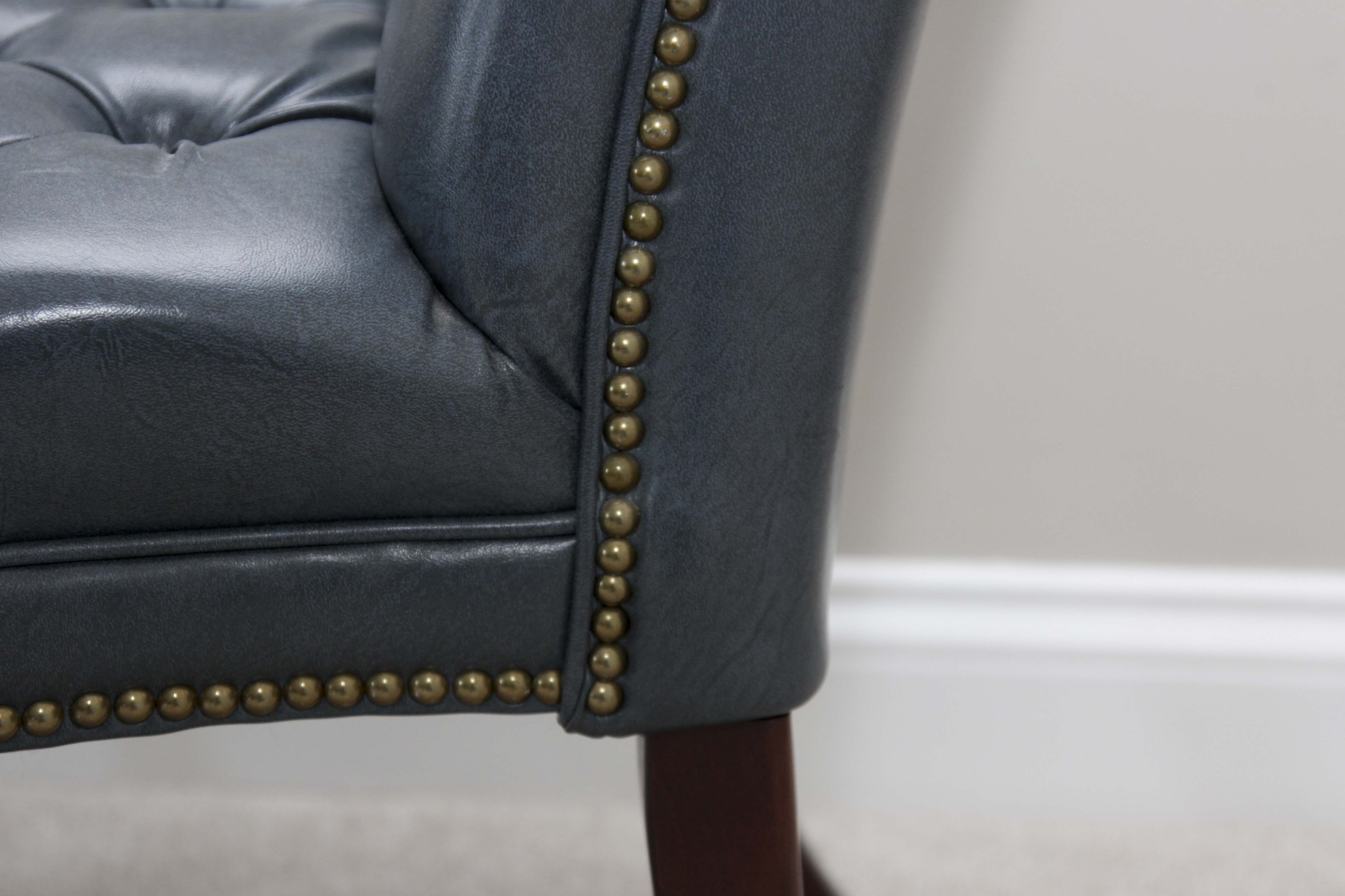 A Pair of Steel Blue Upholstered Tufted Chairs
