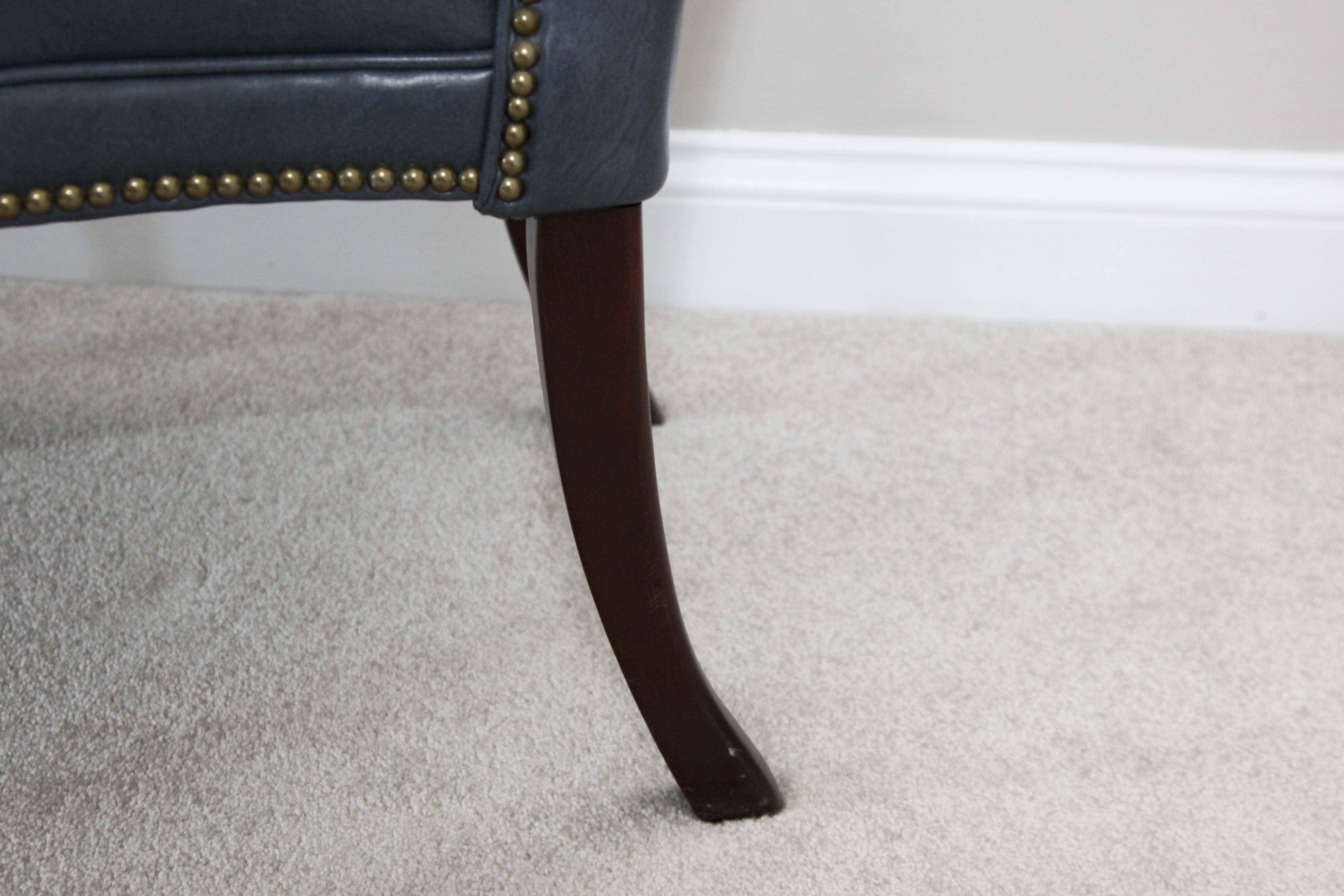 A Pair of Steel Blue Upholstered Tufted Chairs