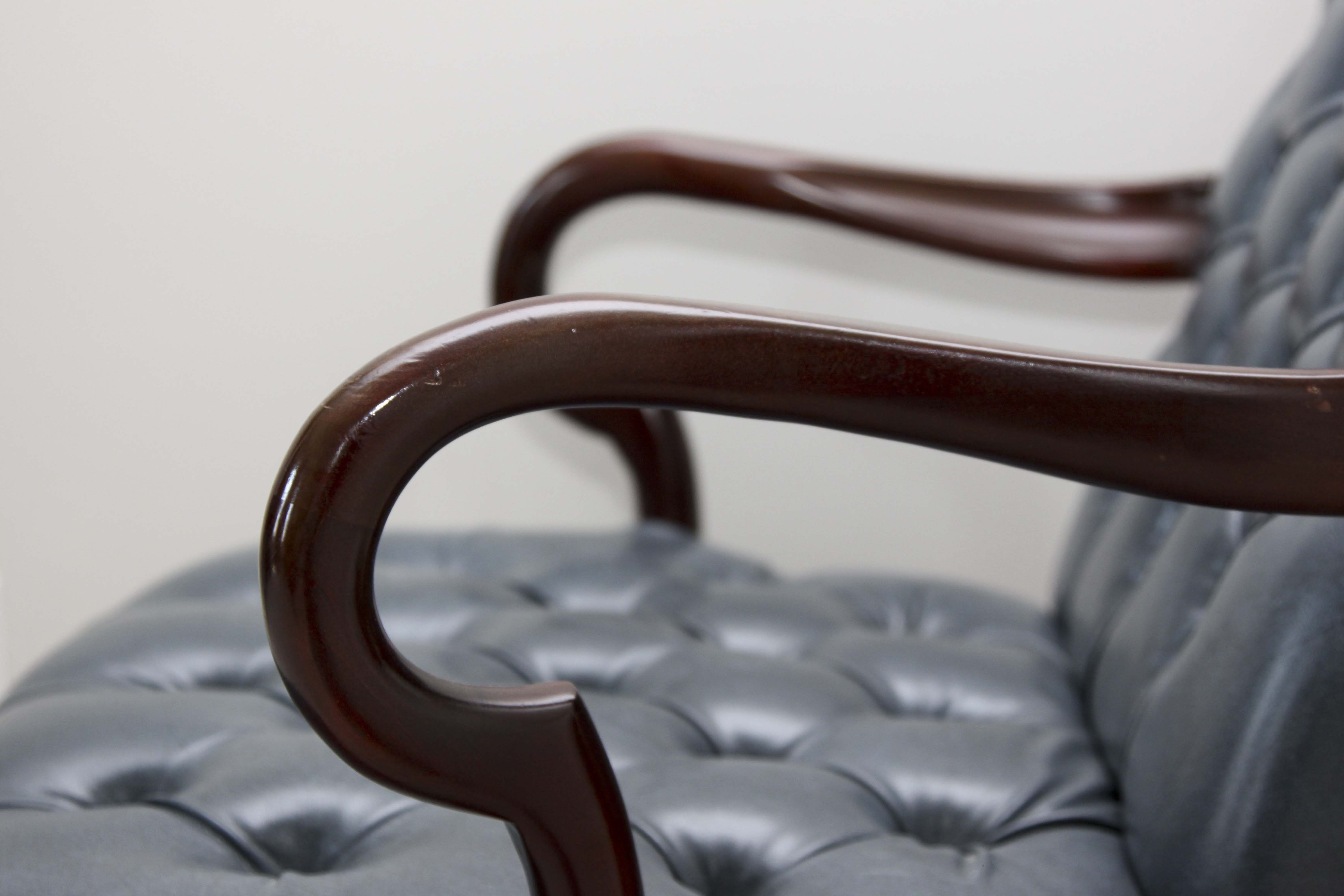 A Pair of Steel Blue Upholstered Tufted Chairs