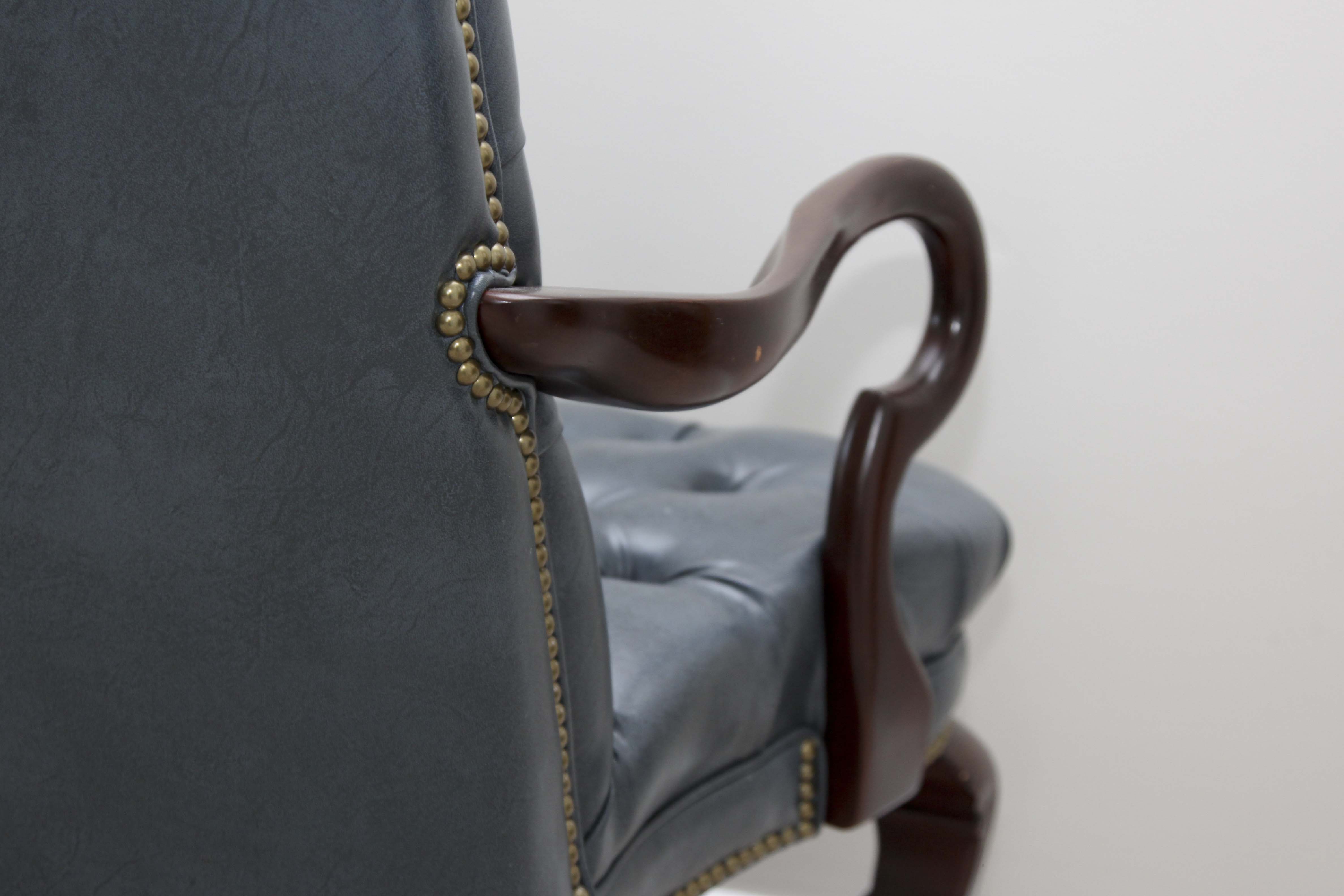 A Pair of Steel Blue Upholstered Tufted Chairs