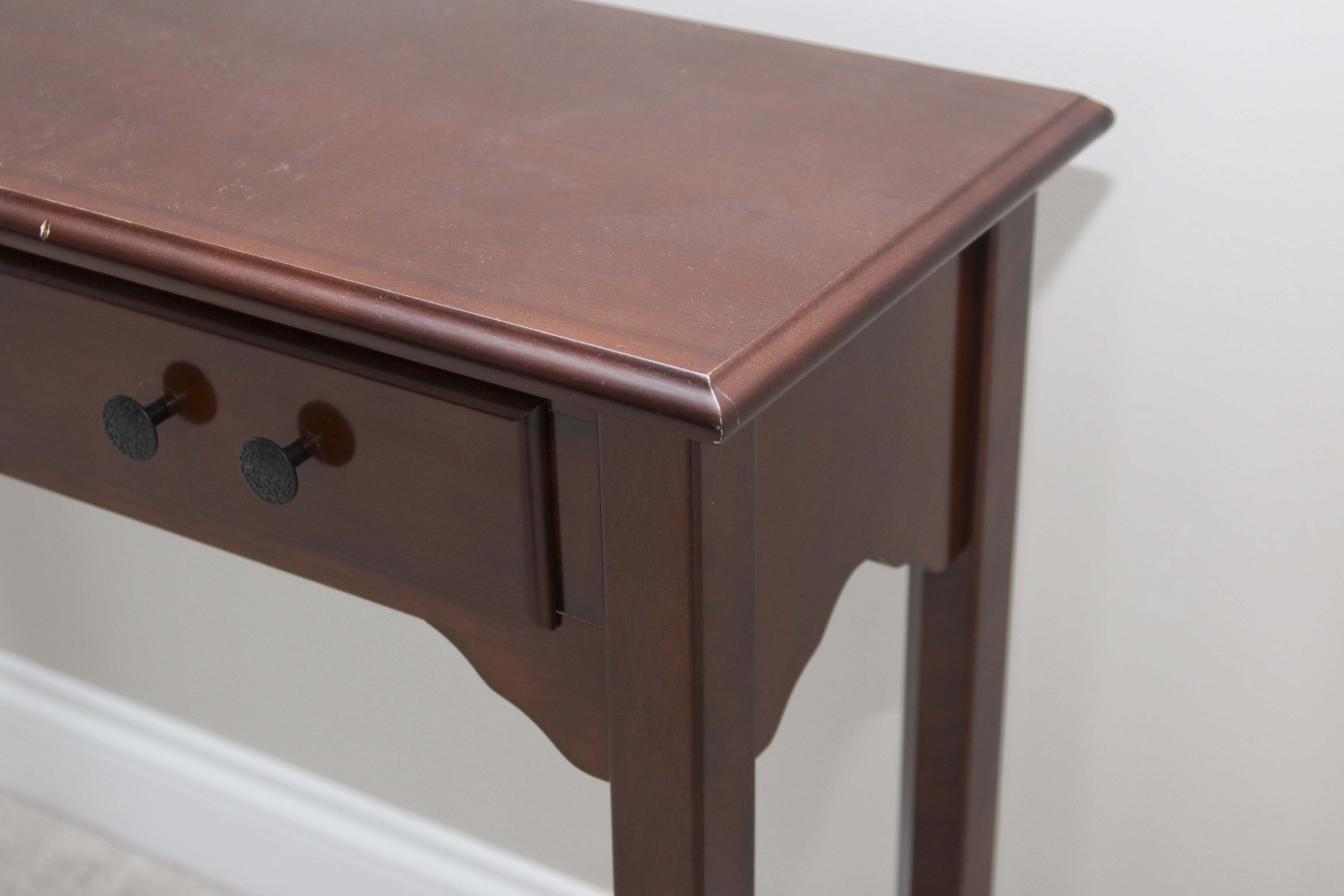 A Three Drawer Console Table