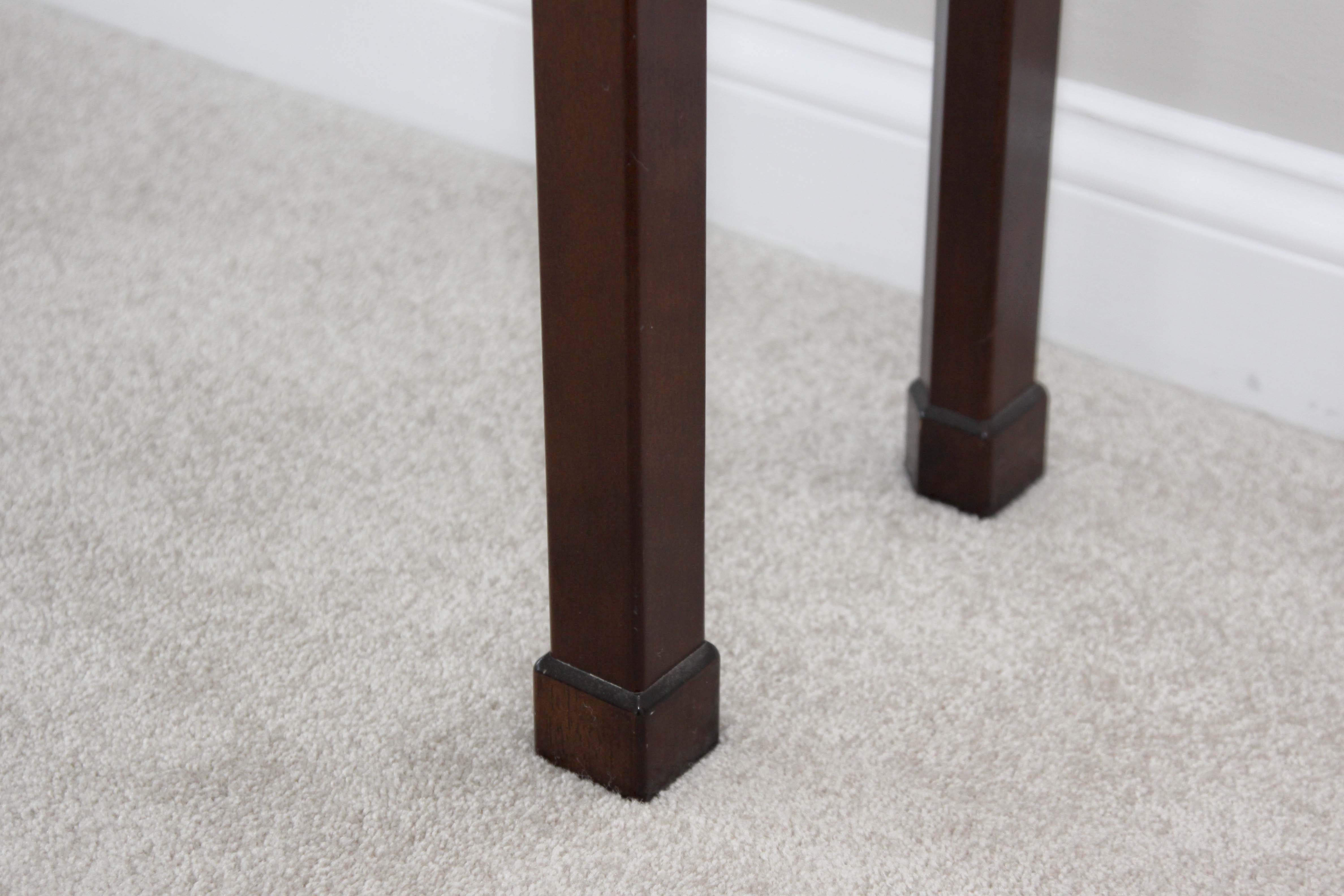 A Three Drawer Console Table