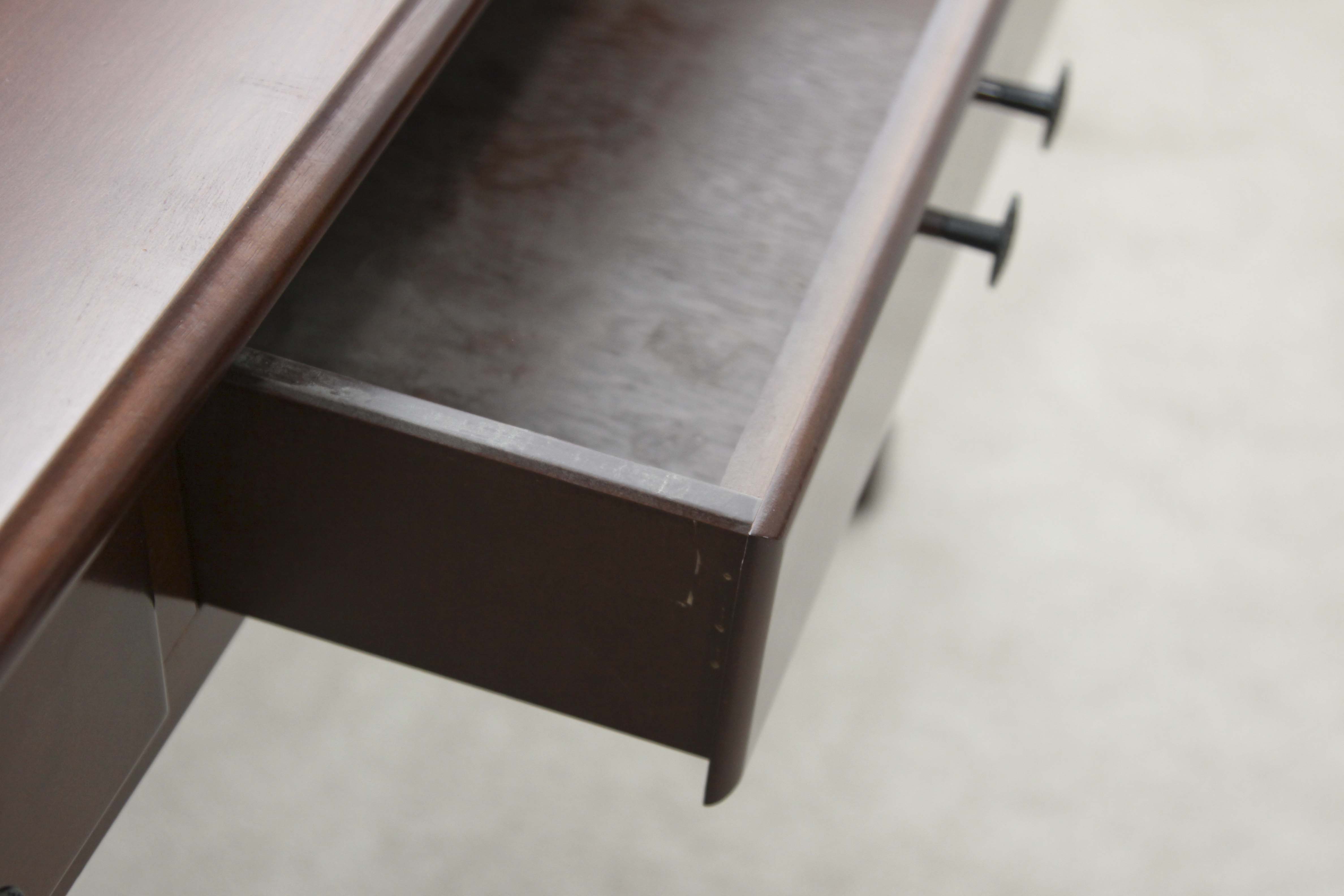 A Three Drawer Console Table