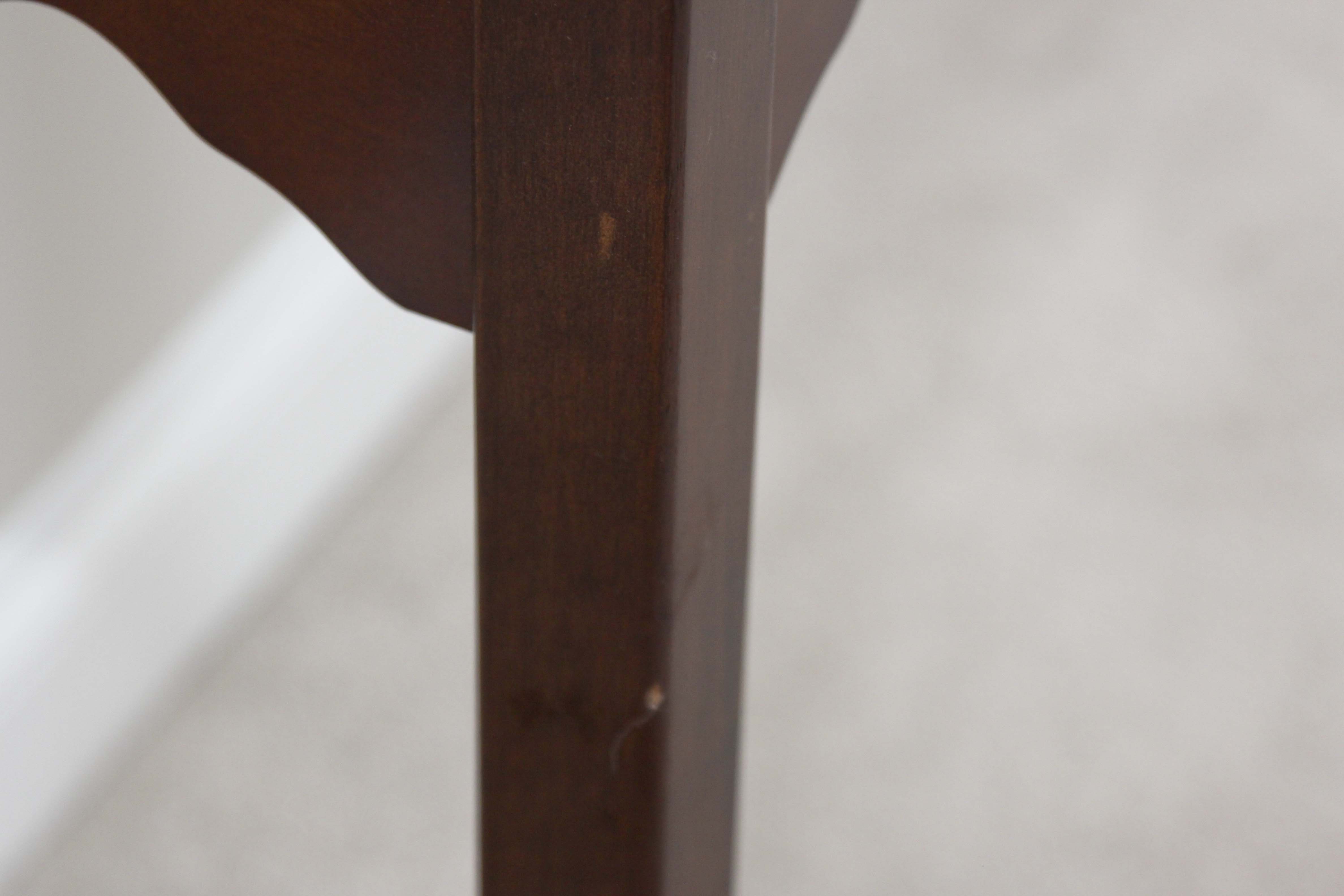 A Three Drawer Console Table