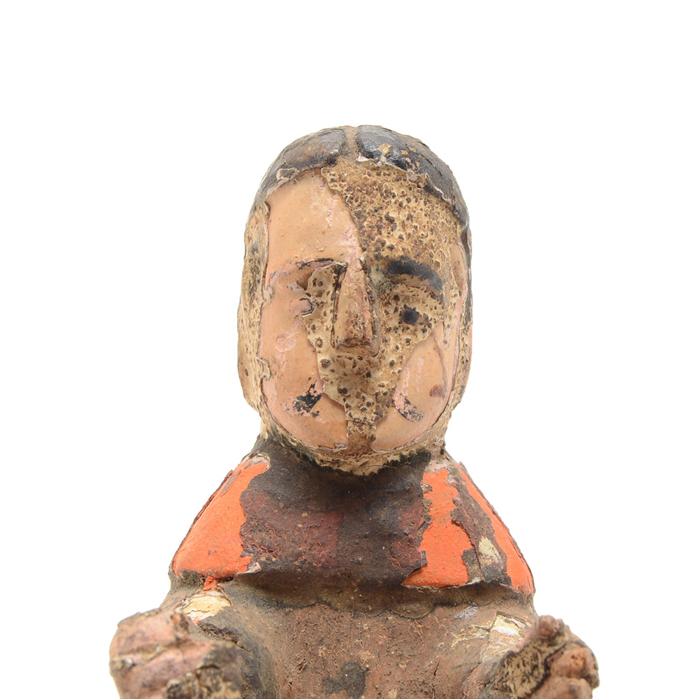 Four Hand Carved Santos Figurines