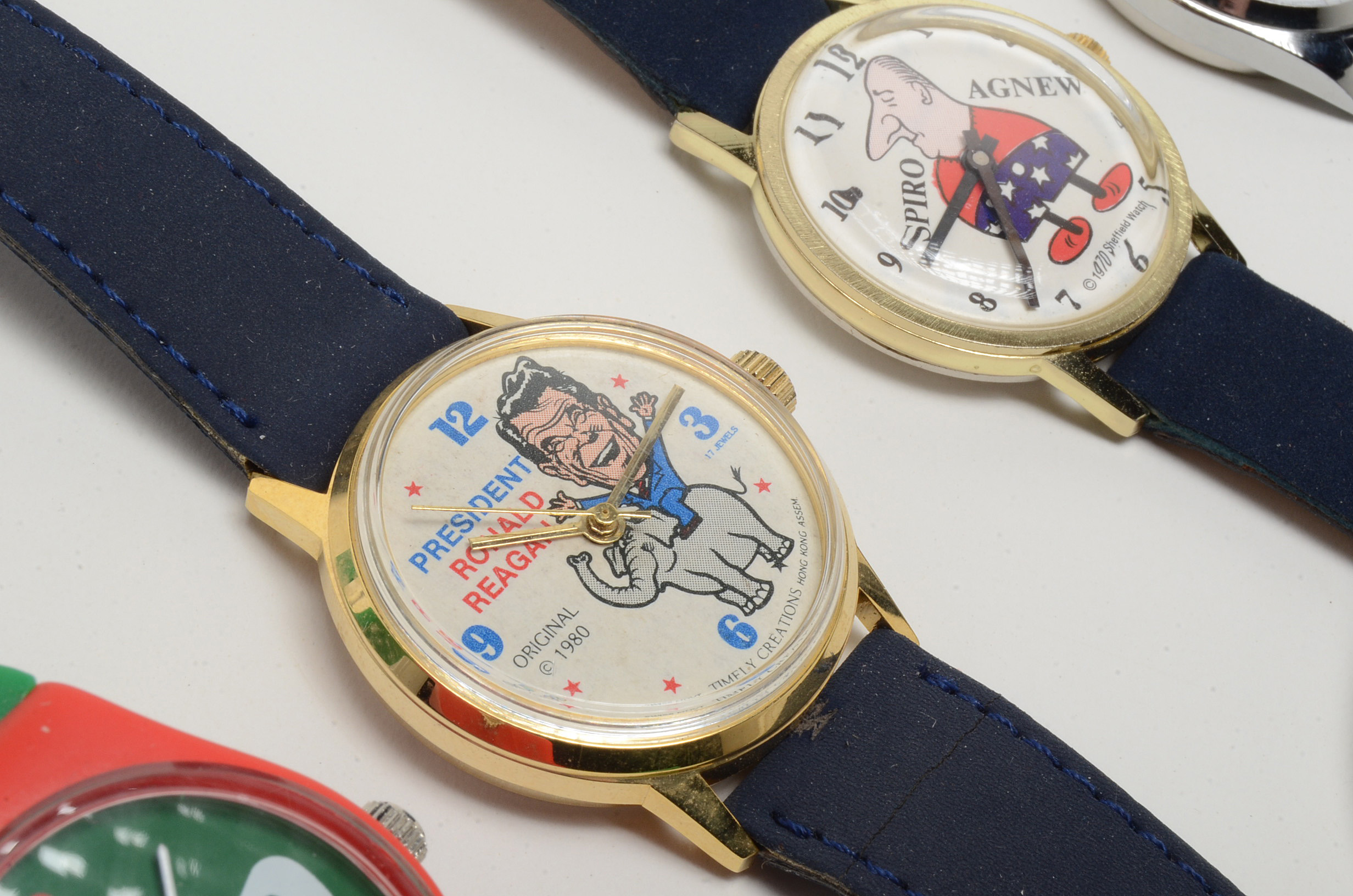 Collection of Themed Wrist Watches with an Ad Pin