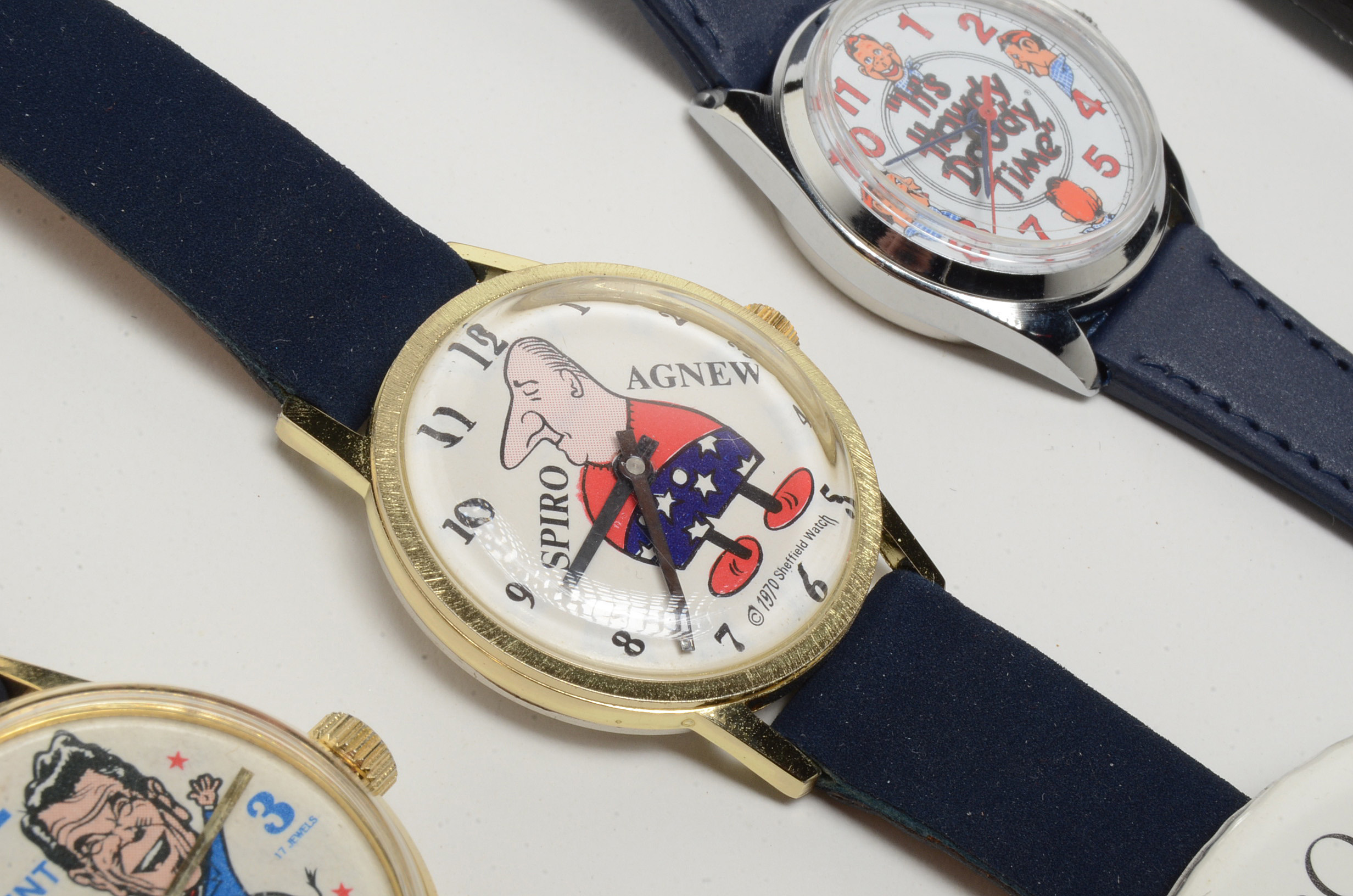Collection of Themed Wrist Watches with an Ad Pin