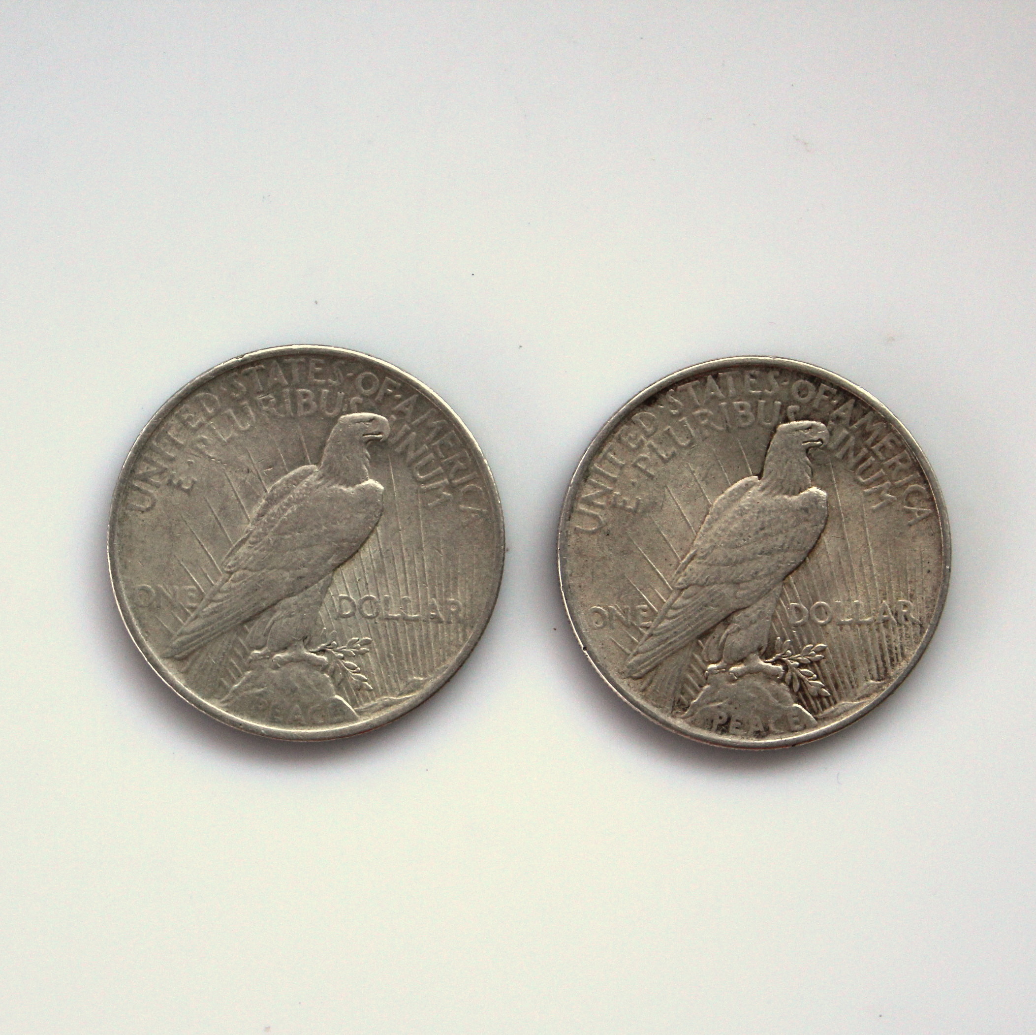 Two Peace Silver Dollars