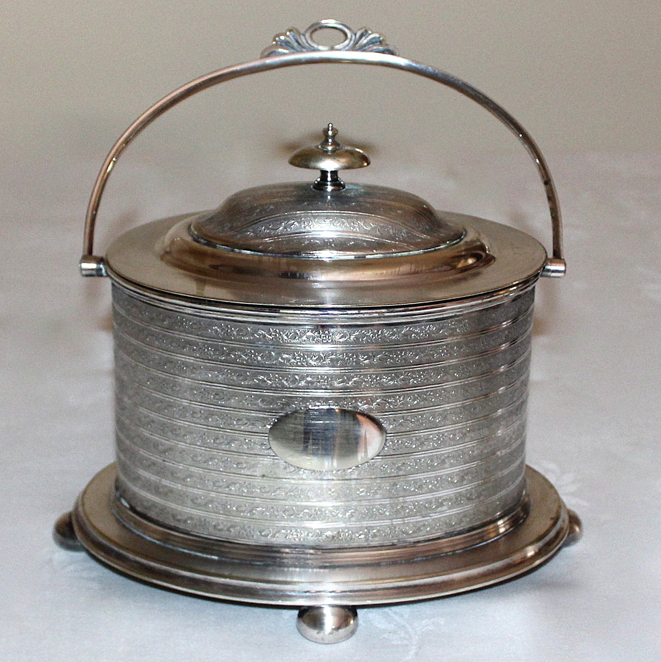 Victorian Biscuit Box and Two Vintage Expandable Trivets