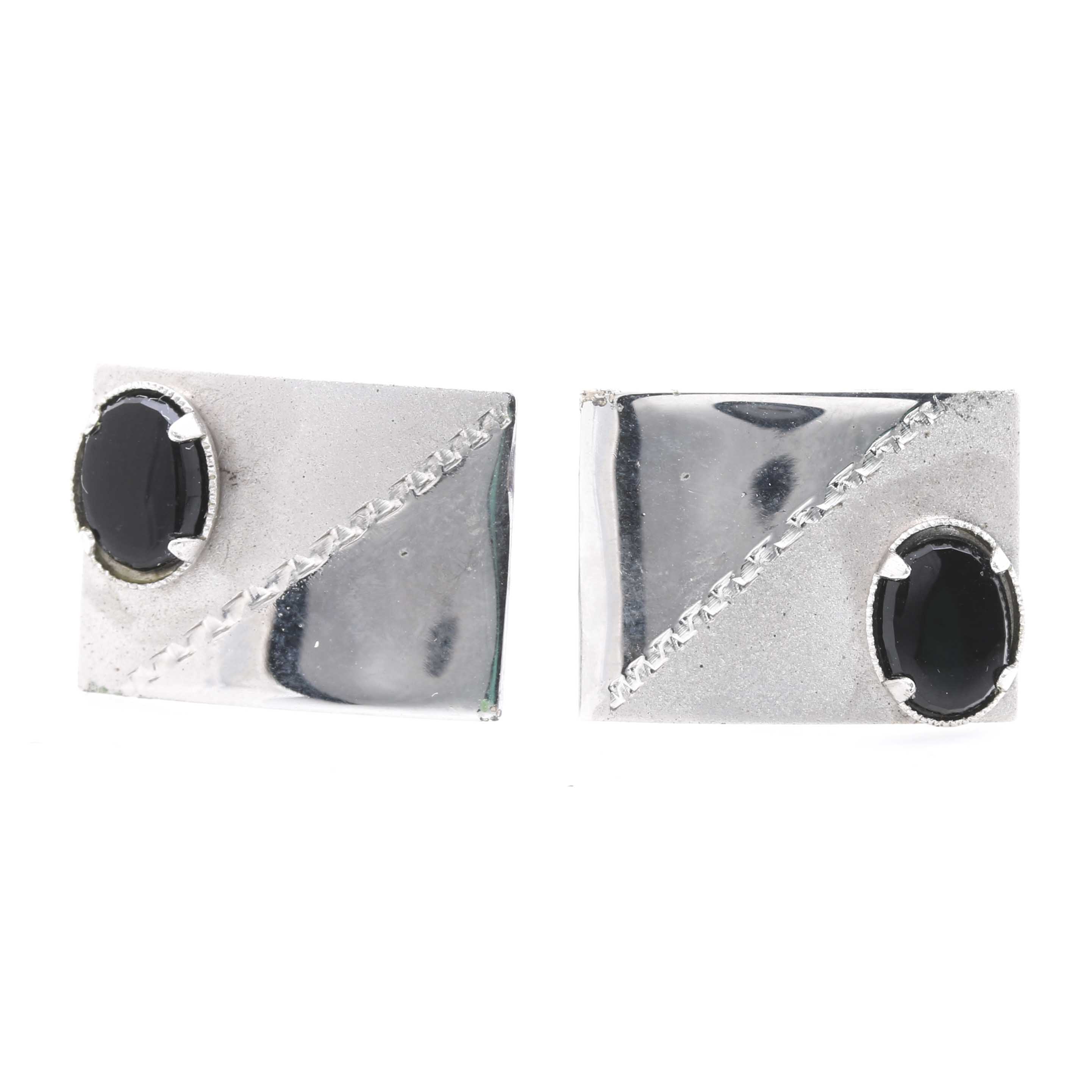 Assortment of Mixed Metal Jewelry With Gemstones