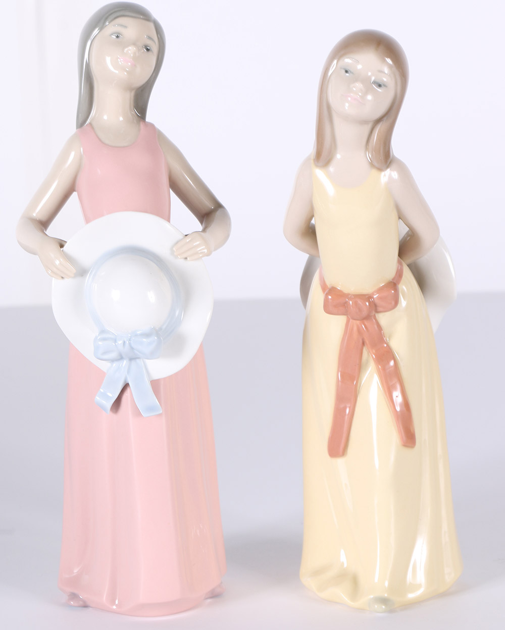 Lladró "Naughty Girl" and "Bashful Girl" Porcelain Figurines