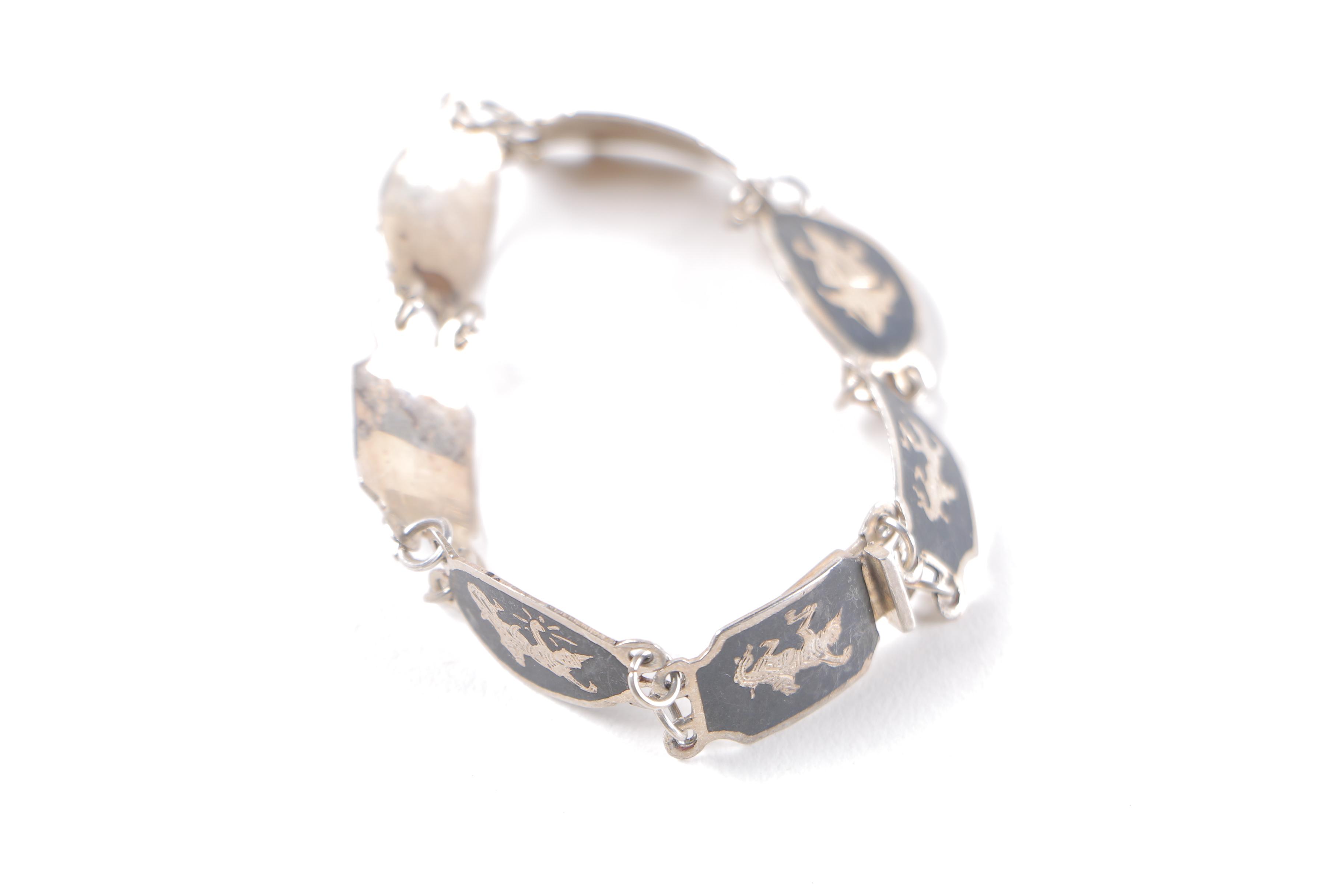 Sterling Silver Jewelry Including Earrings, Brooch, and Link Bracelet