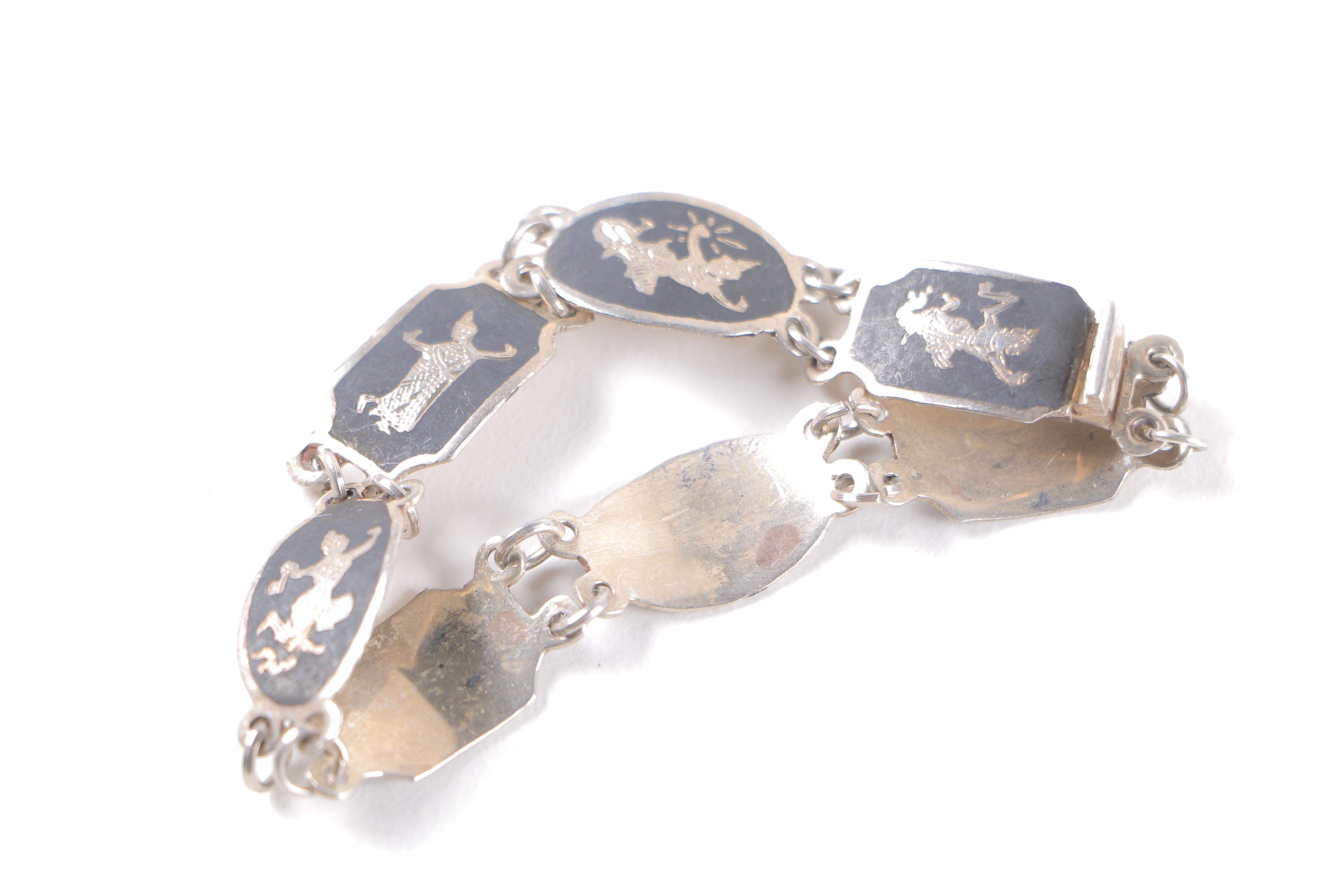 Sterling Silver Jewelry Including Earrings, Brooch, and Link Bracelet