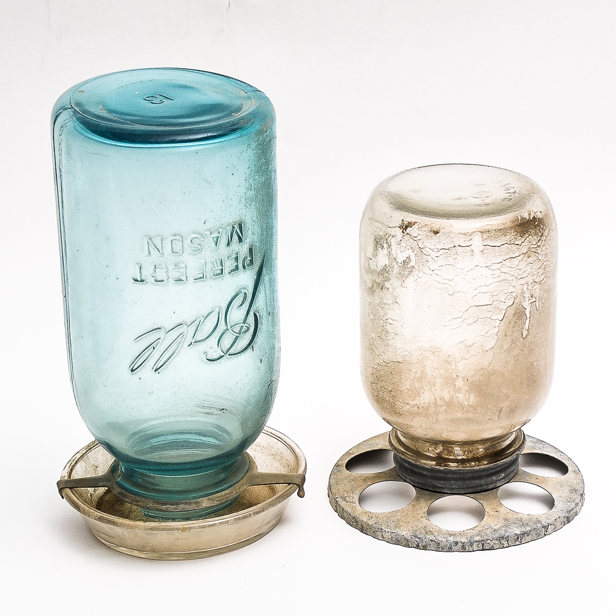 Pair of Vintage Glass Feeders