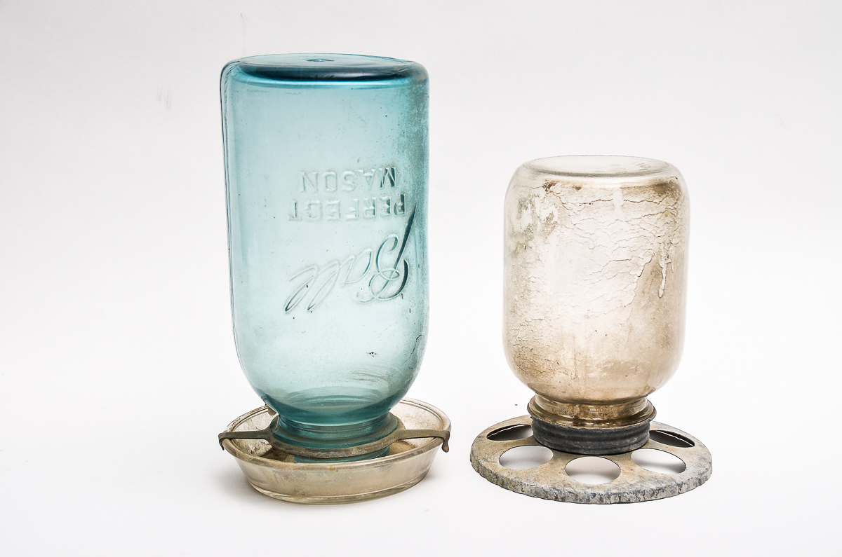 Pair of Vintage Glass Feeders