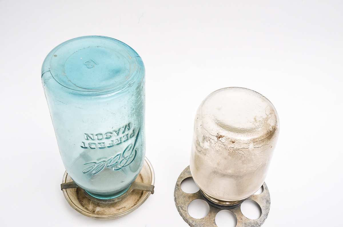 Pair of Vintage Glass Feeders